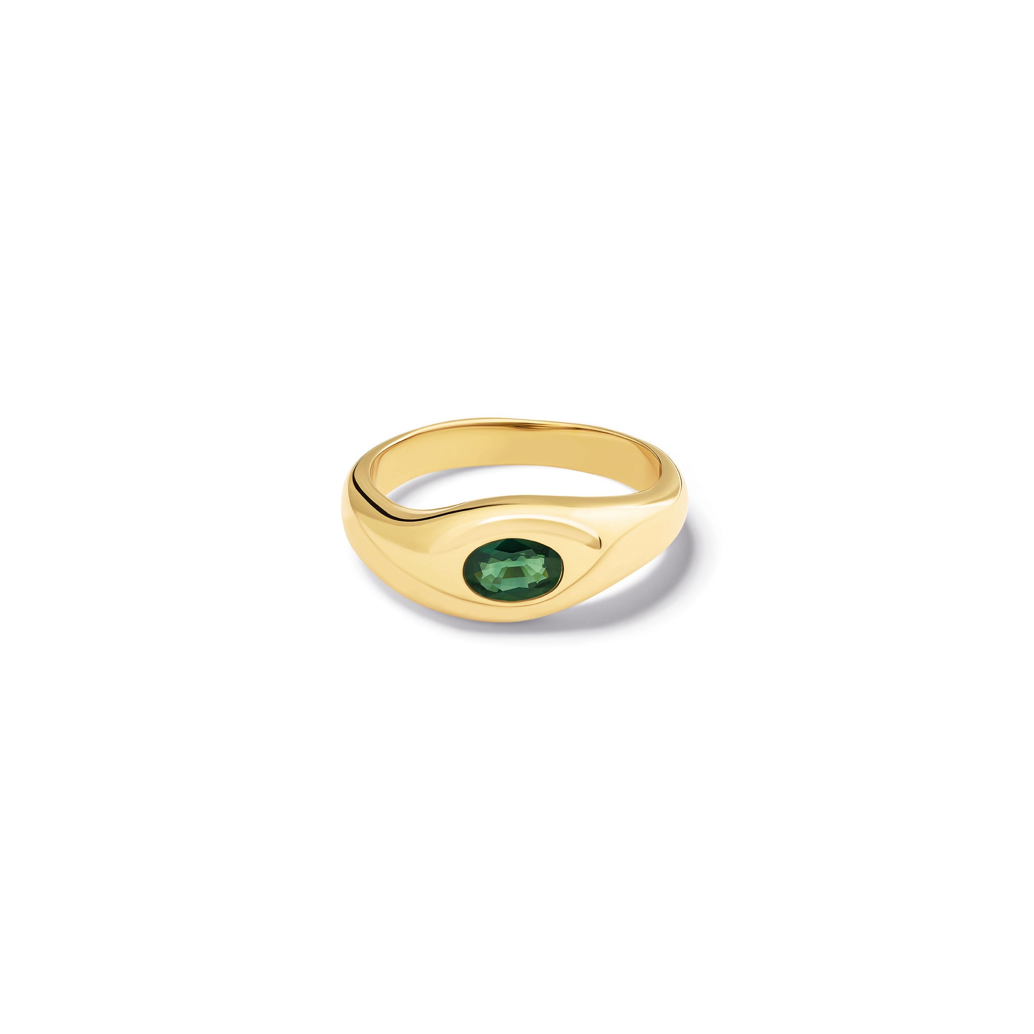 Handcrafted yellow gold ring with a slight teardrop design set with an oval facetted green sapphire.