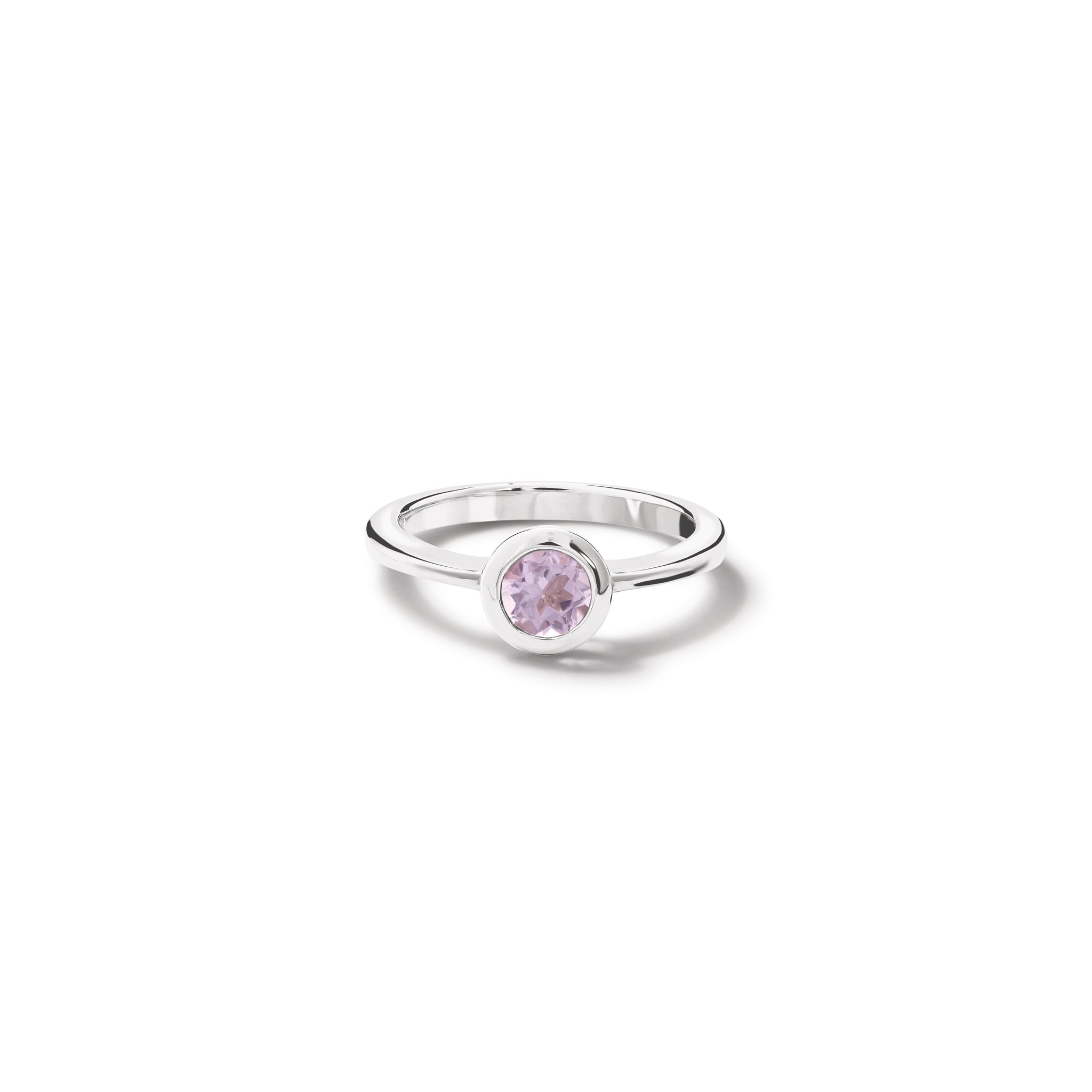 Handcrafted sterling silver ring with a central amethyst, birthstone of February. 