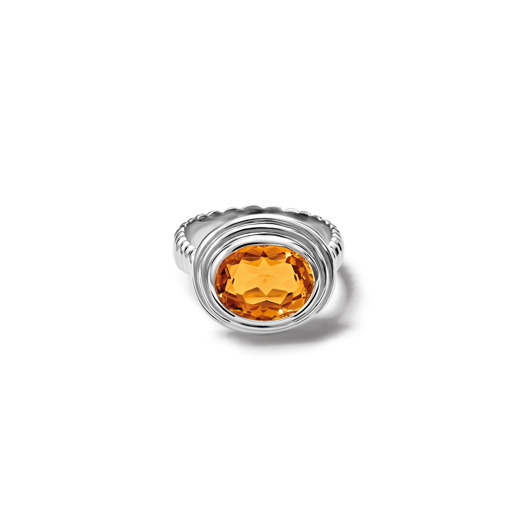 Handcrafted sterling silver ring featuring a prominent oval citrine, birthstone of November.