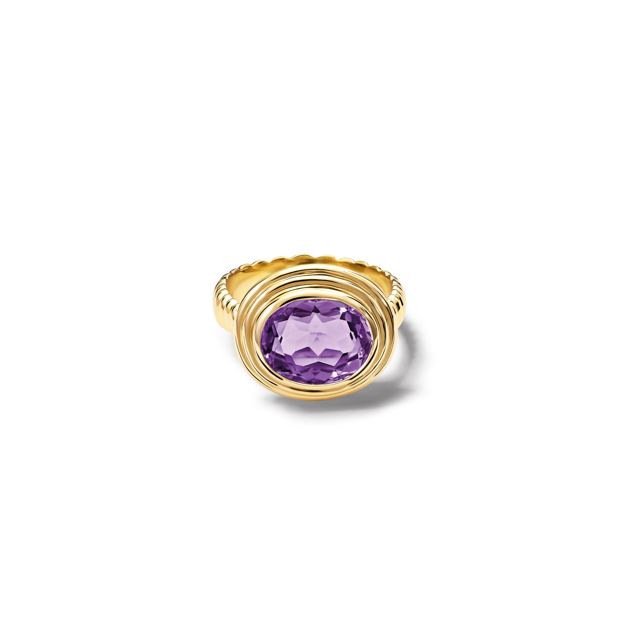 Handcrafted yellow gold ring featuring a prominent oval amethyst, birthstone of February.