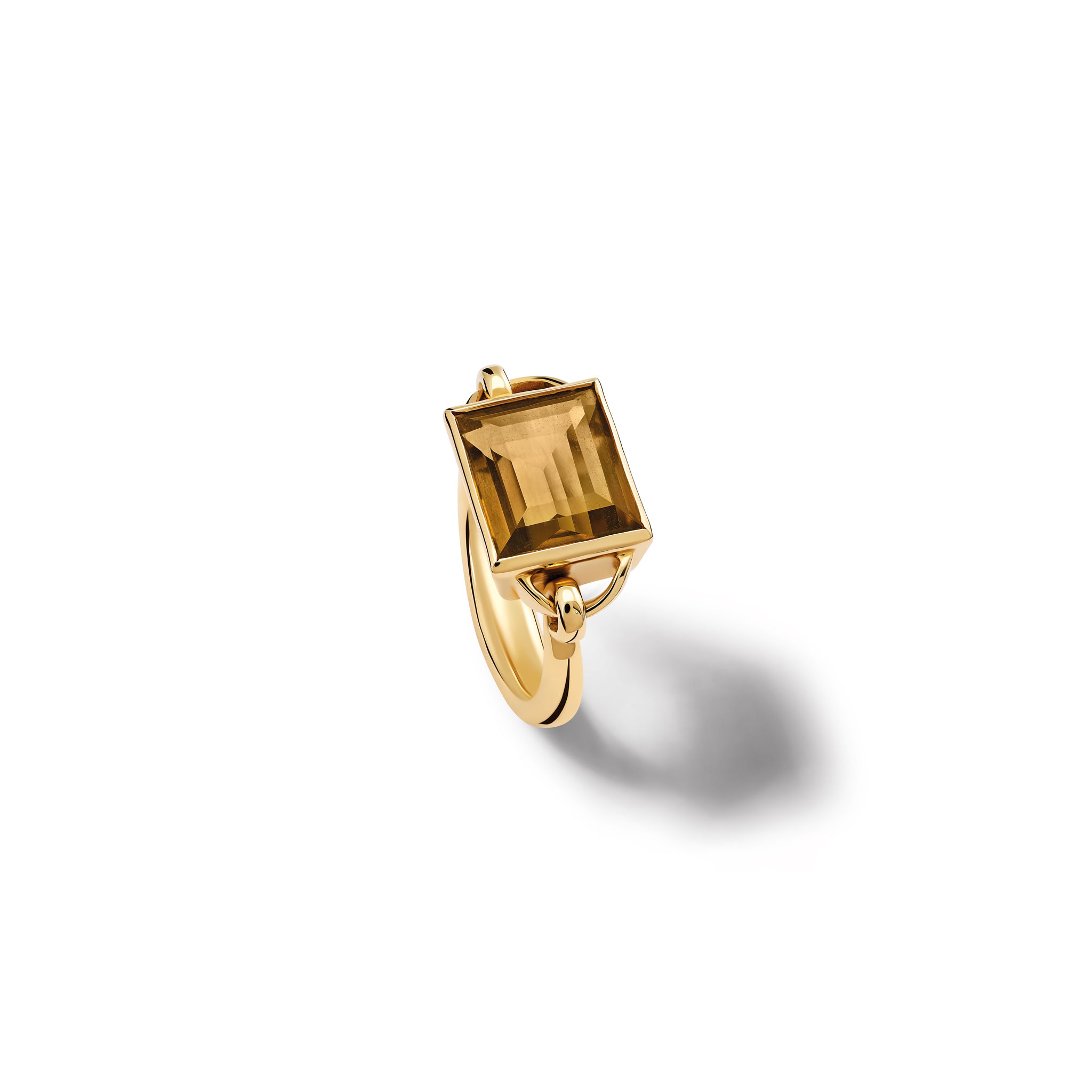 Handcrafted yellow gold ring featuring a central smoky quartz.