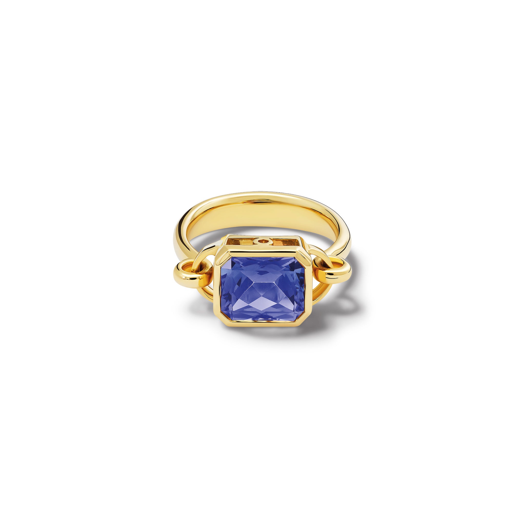 Handcrafted 18ct yellow gold ring featuring a central tanzanite, birthstone of December.