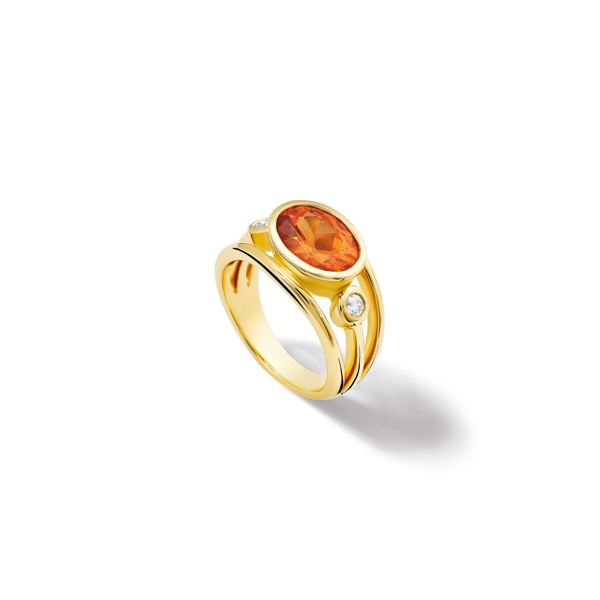 Handcrafted 18ct yellow gold ring with a central mandarin garnet, the birthstone of January, flanked by two round diamonds.