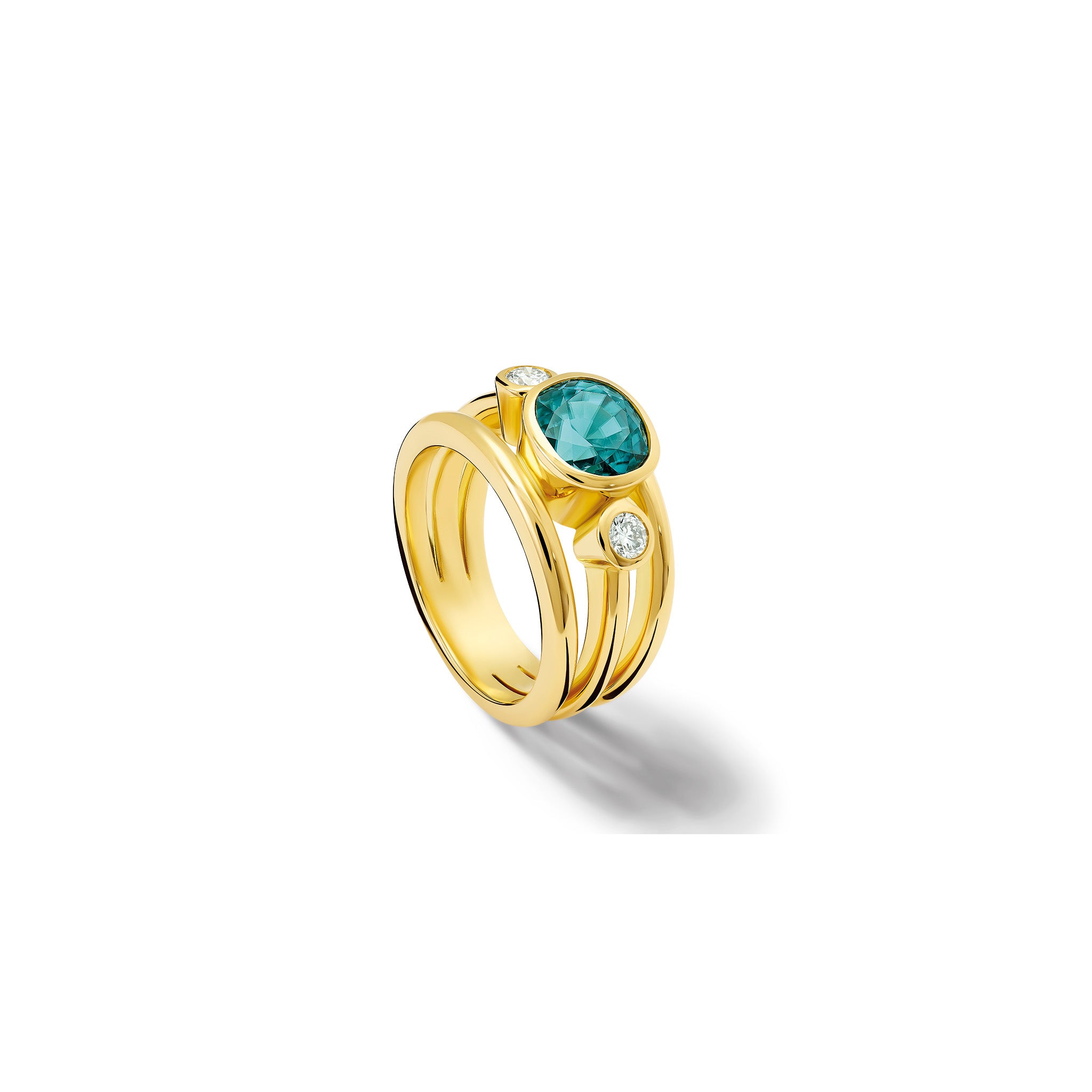 Handcrafted 18ct yellow gold ring with a central blue zircon, the birthstone of December, flanked by two round diamonds.