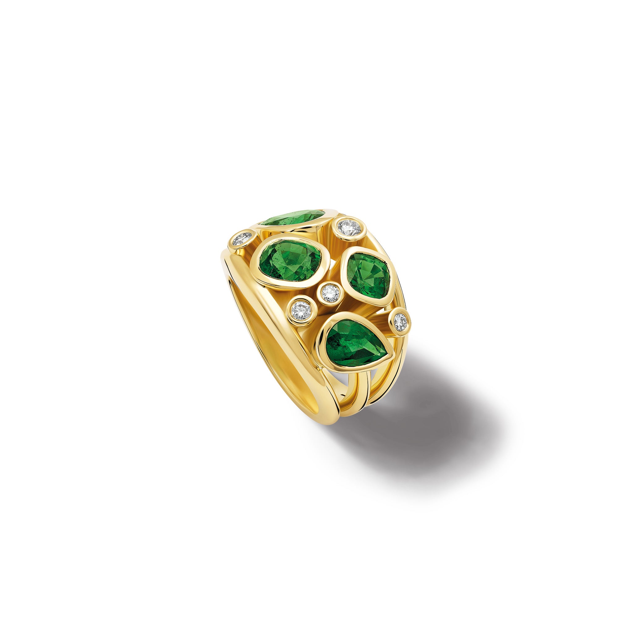 Handcrafted 18ct yellow gold ring featuring four demantoid green garnets and smaller diamonds.