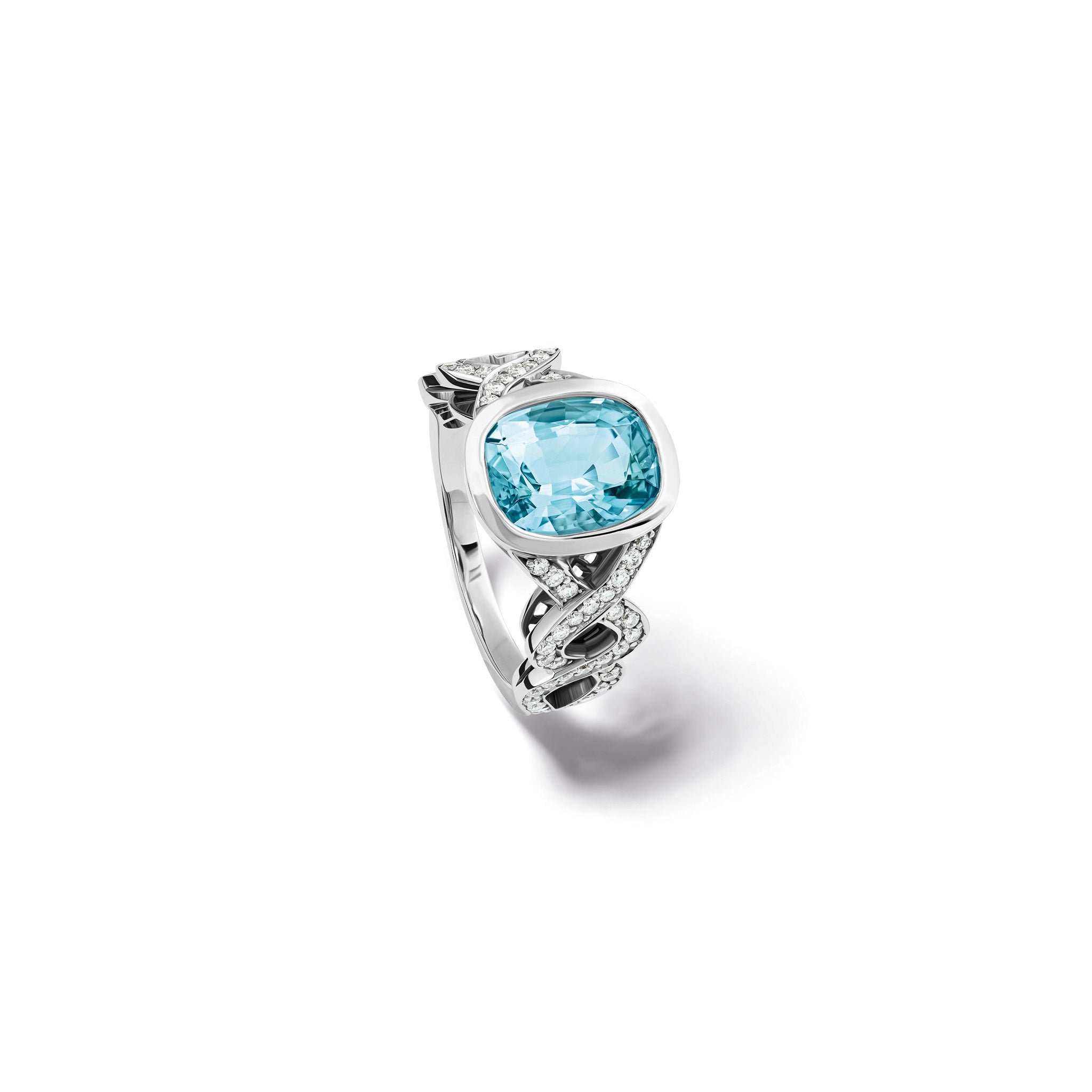 Handcrafted 18ct white gold ring featuring a cushion cut green blue aquamarine with a twisted diamond pavé shank.