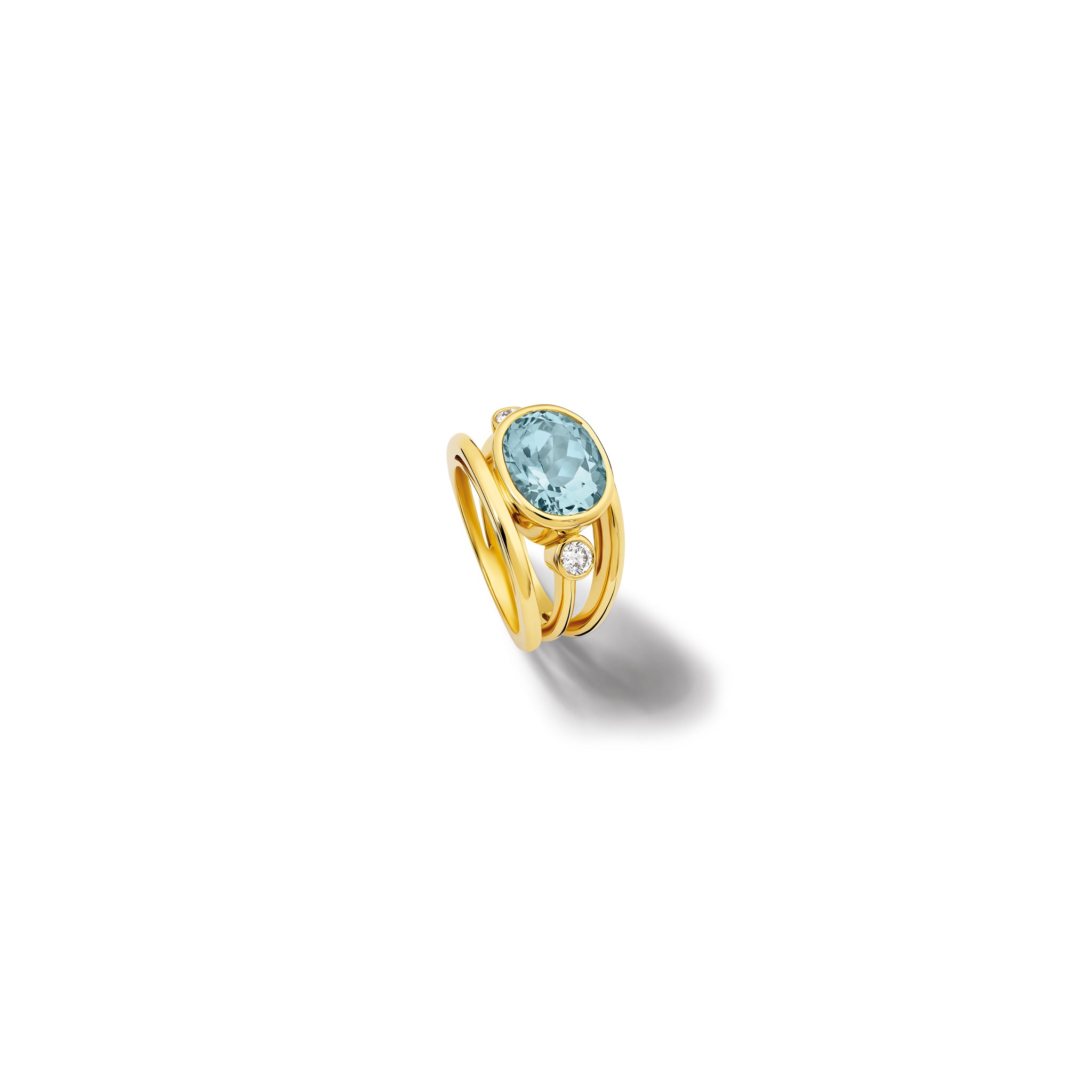 Handcrafted 18ct yellow gold ring with a central aquamarine, the birthstone of March, flanked by two round diamonds.