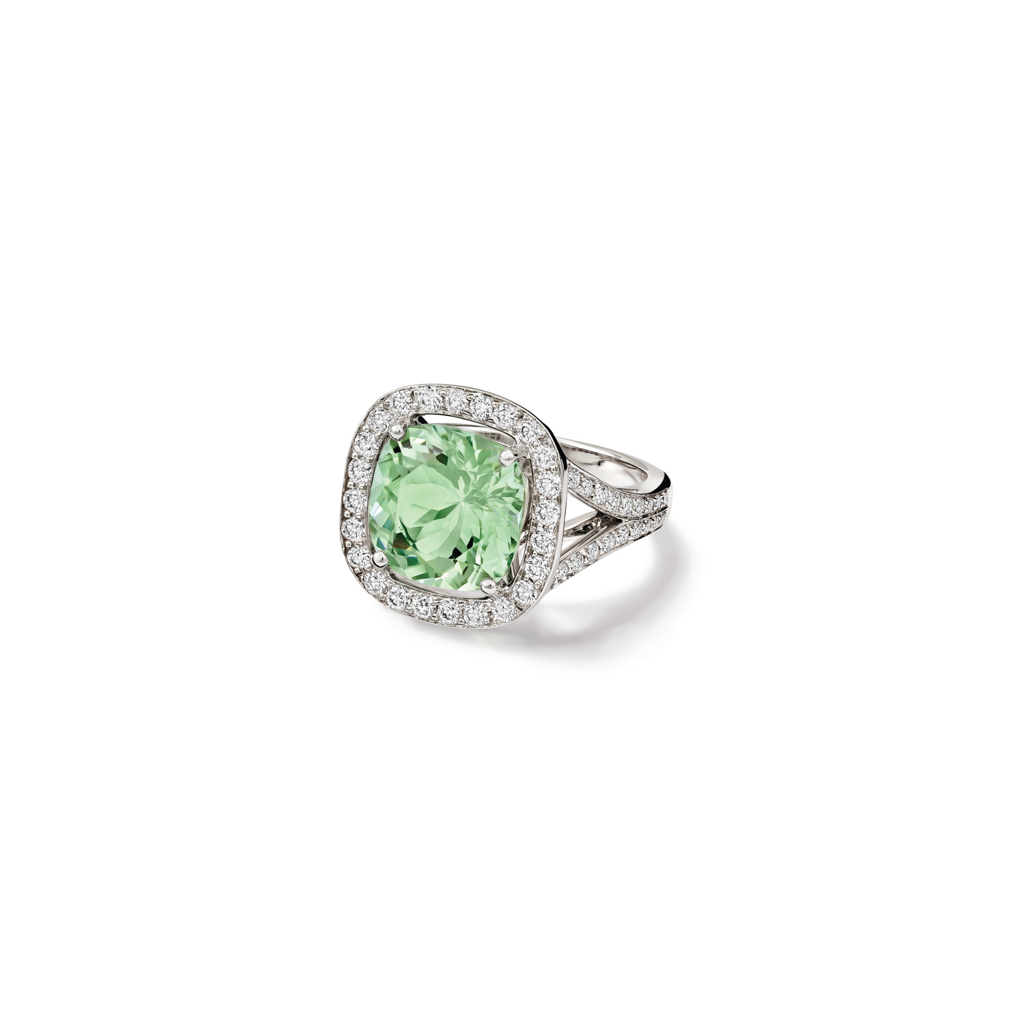 Handcrafted 18ct white gold engagement ring featuring a large, cushion-cut green aquamarine surrounded by a halo of small diamonds and smaller diamonds embedded along the band.