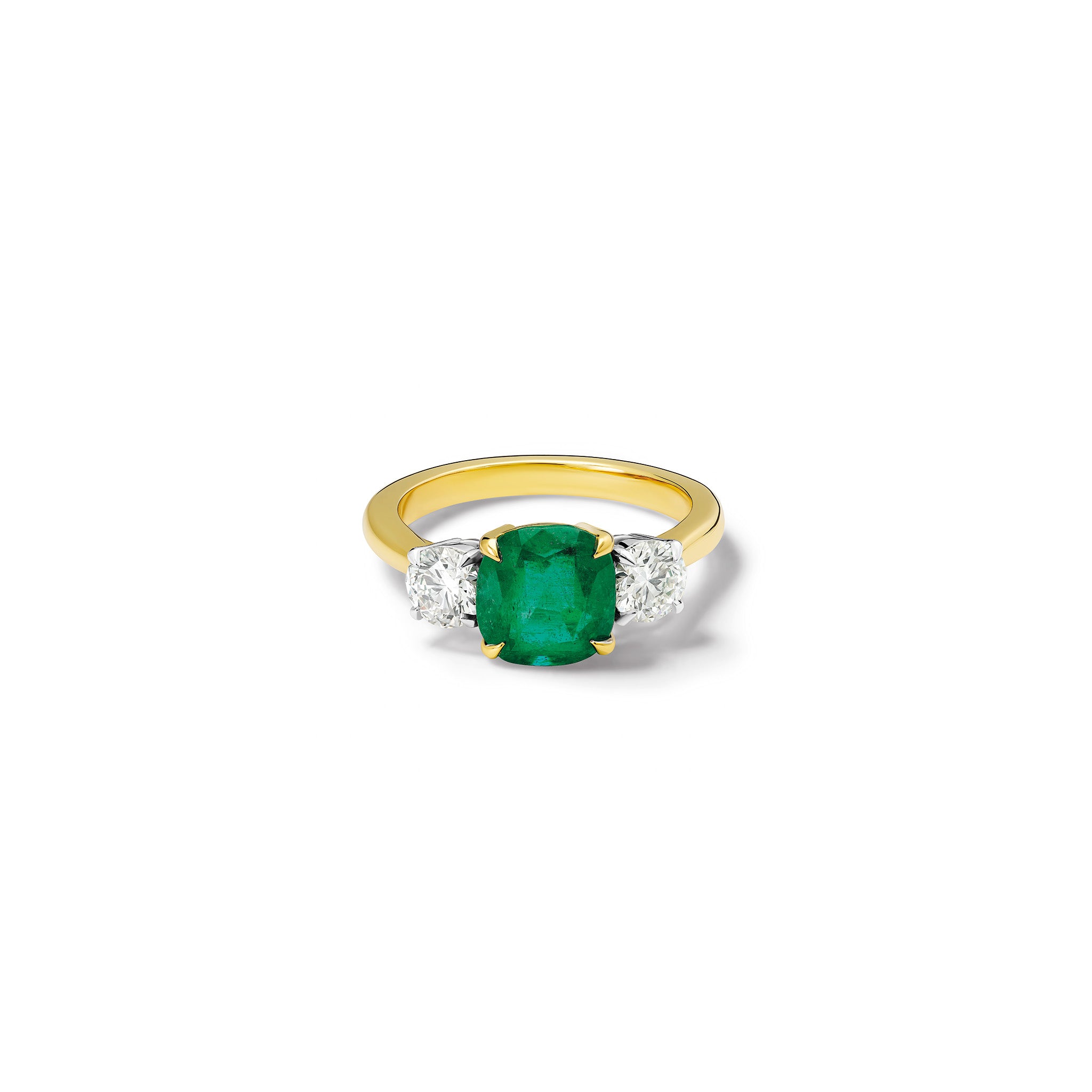 Handmade 18ct yellow gold engagement ring  featuring a large, cushion cut emerald at its centre, surrounded by two smaller teardrop-shaped white diamonds.