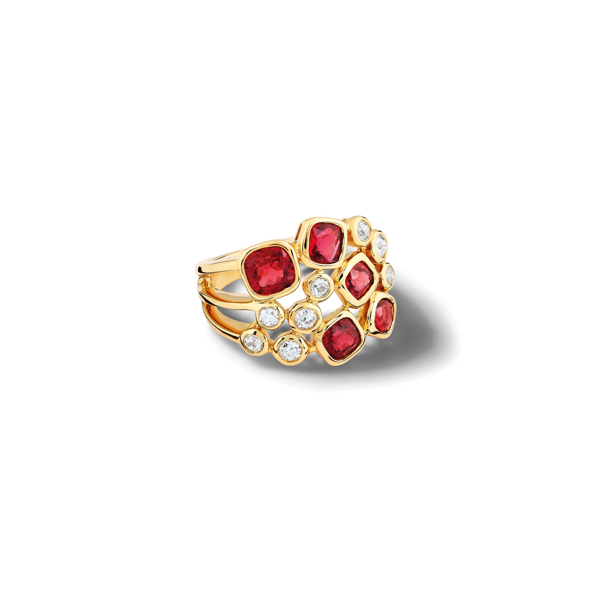 Handcrafted 18ct yellow gold ring featuring different sized round red spinels and diamonds. 