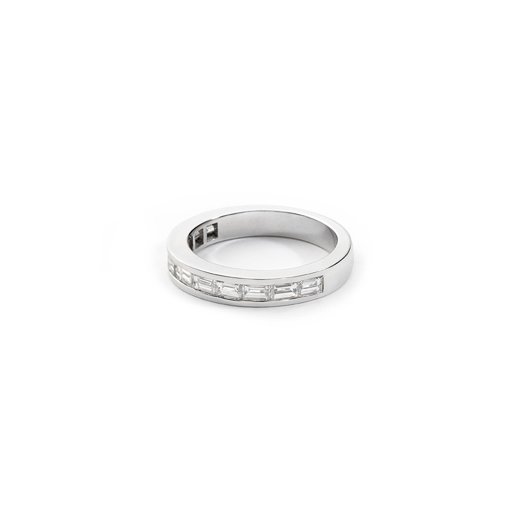 Handcrafted platinum half eternity ring with diamonds.