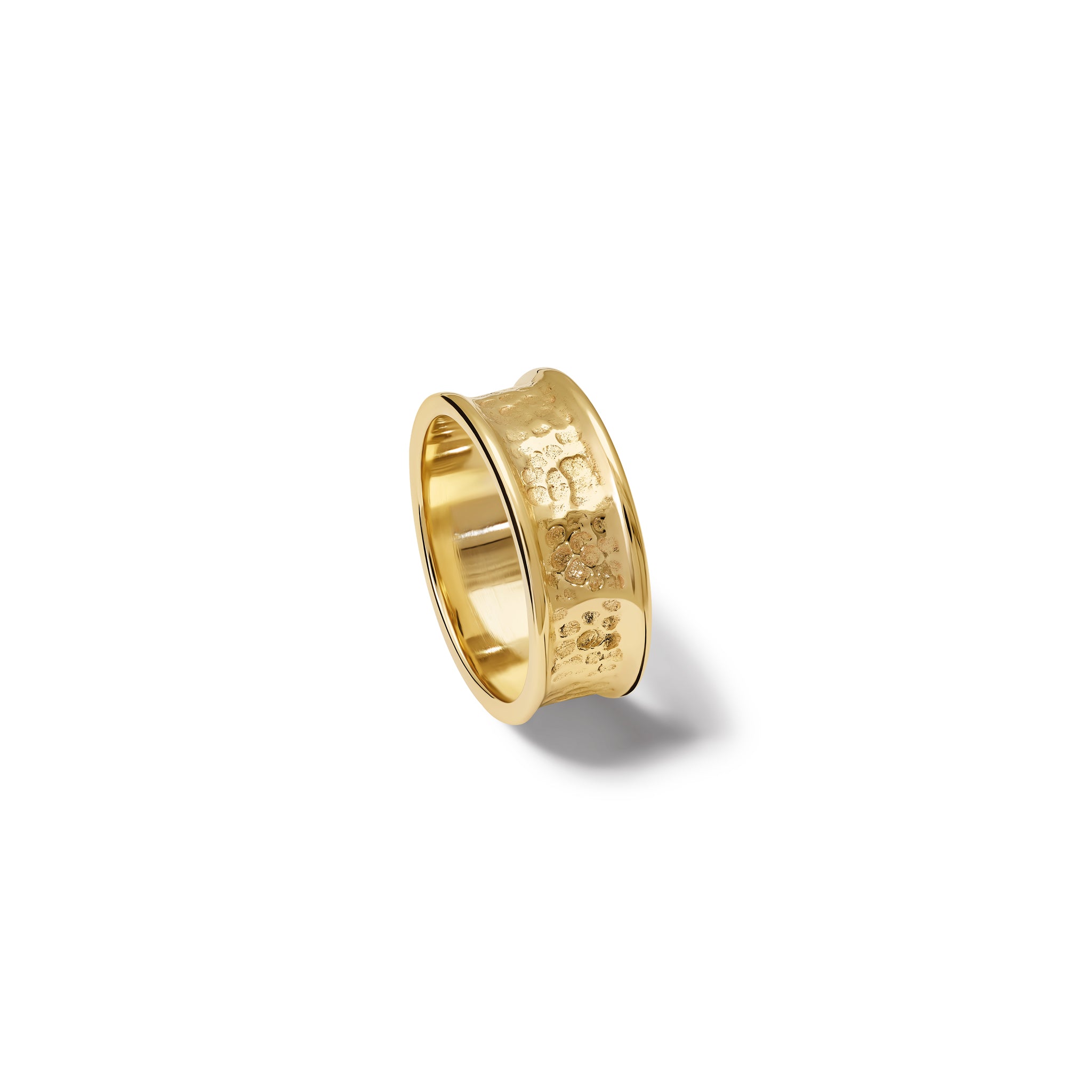 Handcrafted yellow gold ring featuring tortilla shaped circles along the band.
