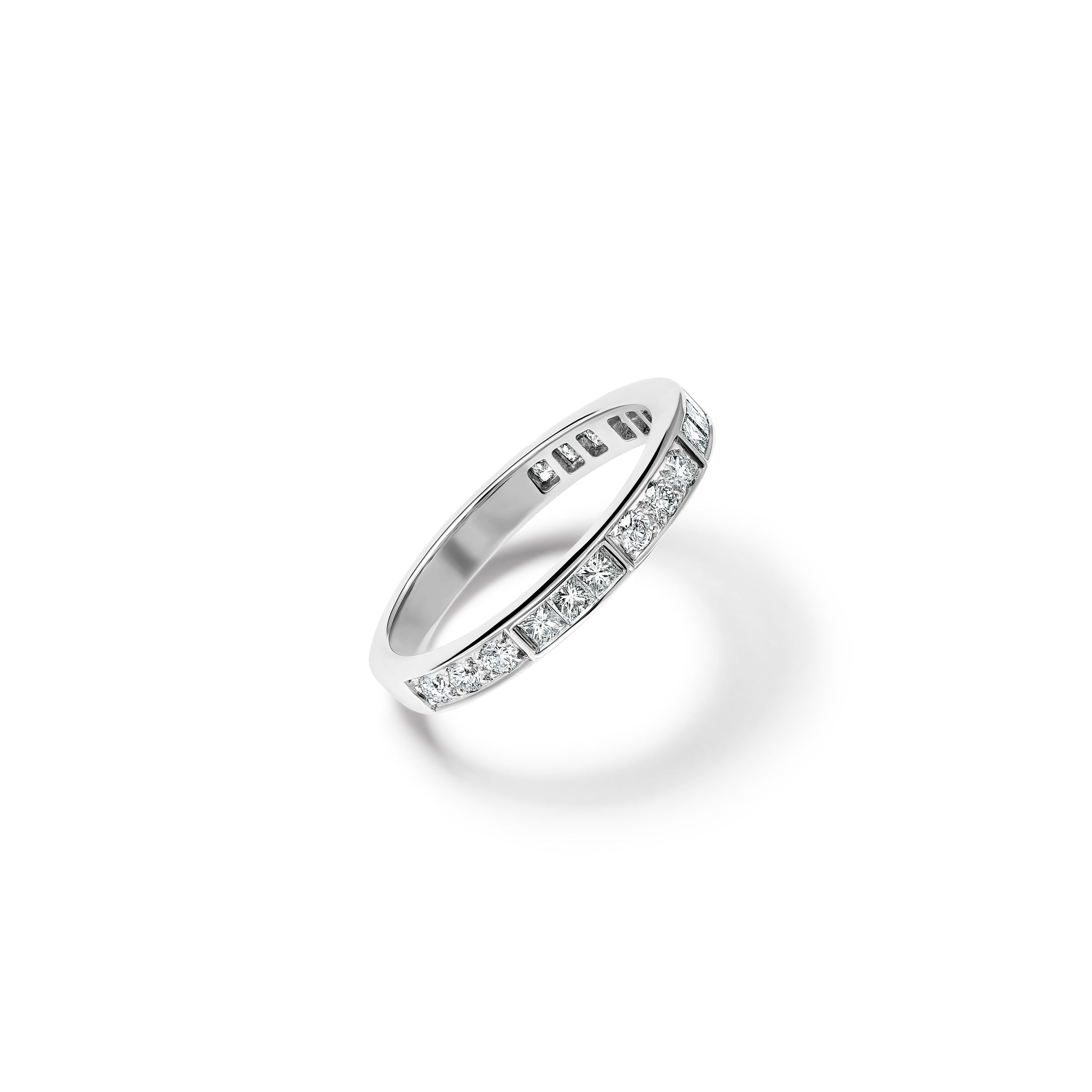 Handcrafted 18ct white gold half eternity ring with diamonds.
