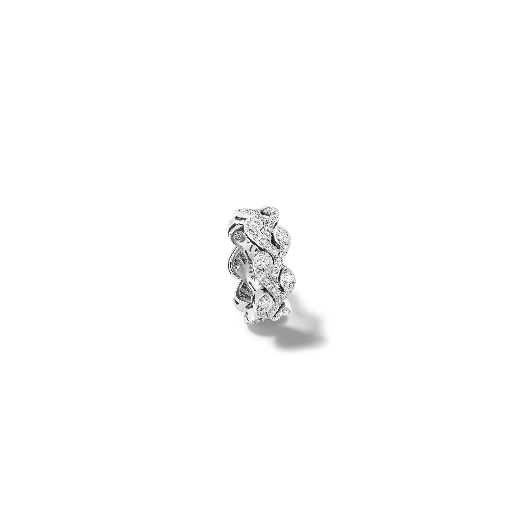 Handcrafted 18ct white gold engagement ring resembling rosemary sprigs, embellished with diamonds.