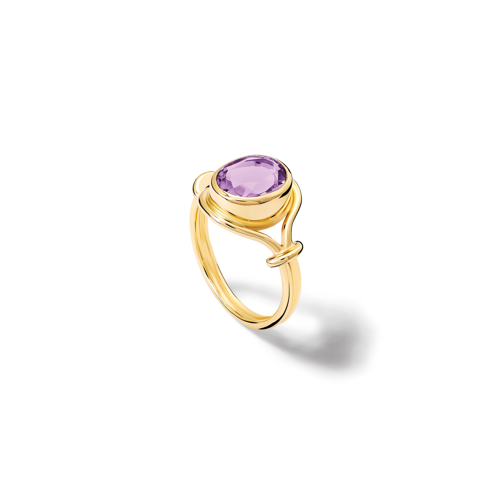 Handcrafted yellow gold signet ring featuring a smooth, round central disc of amethyst with sleek, curved band accents.