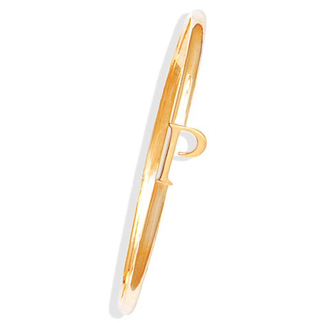 Handcrafted yellow gold bangle with a central yellow gold letter P accent.