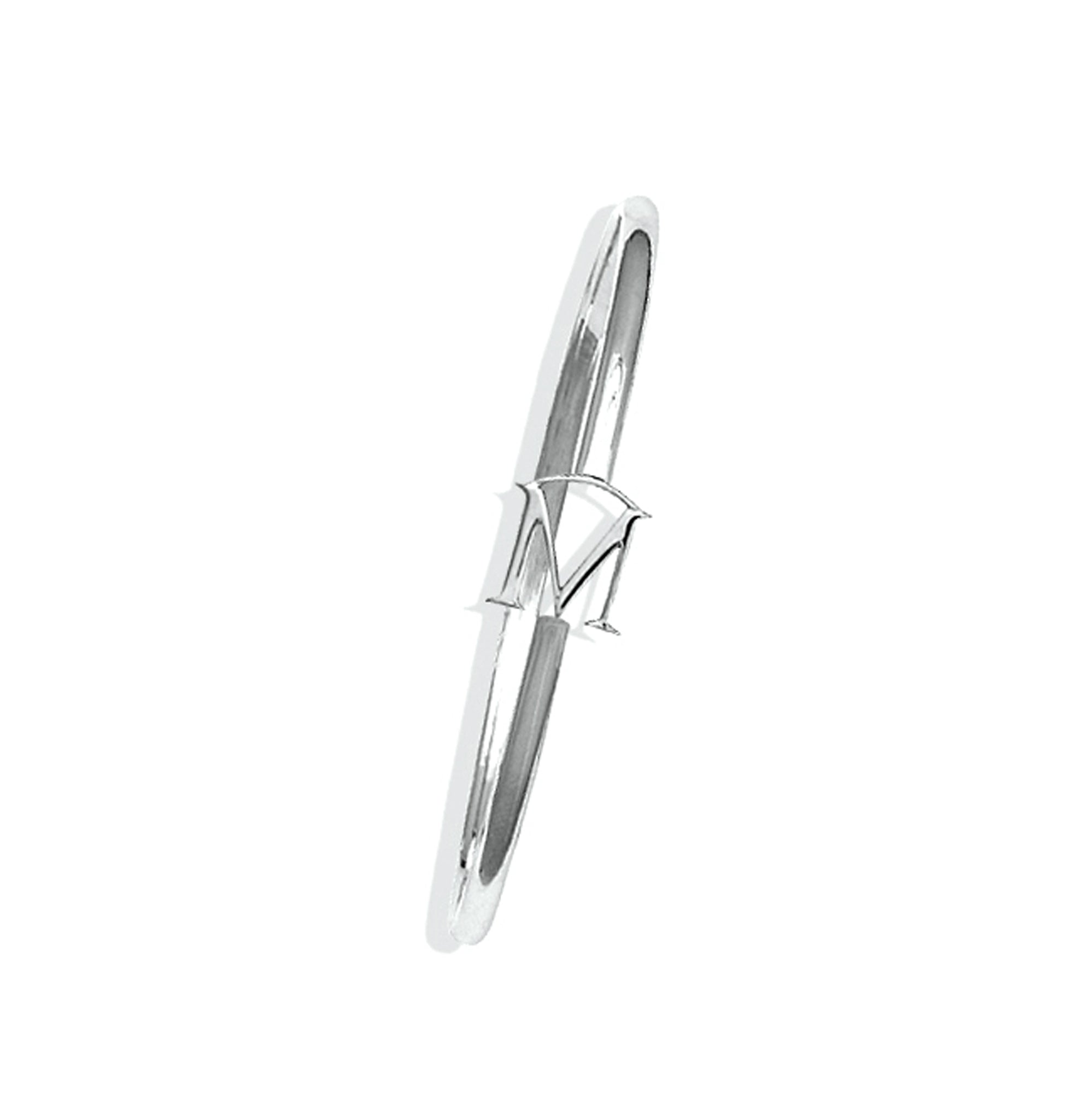 Handcrafted sterling silver bangle with a central silver letter M accent.