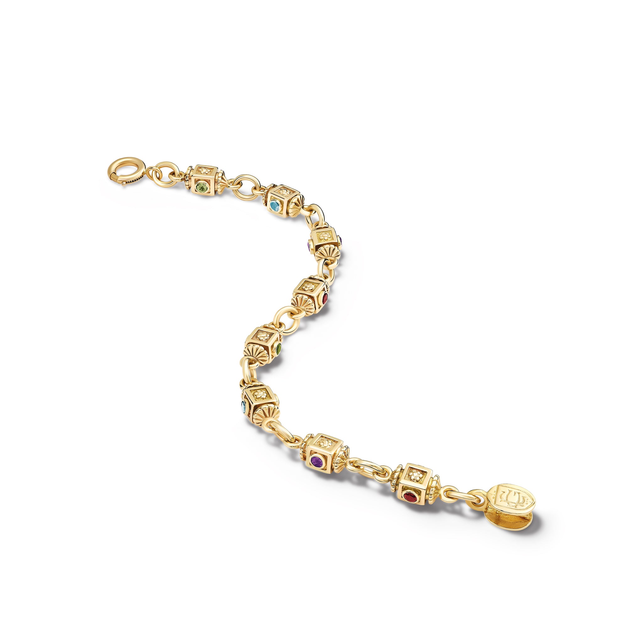 Handcrafted yellow gold bracelet featuring a design of interlocking circles, each connected through intricately detailed set with the precious stones amethyst, peridot, garnet and aquamarine.