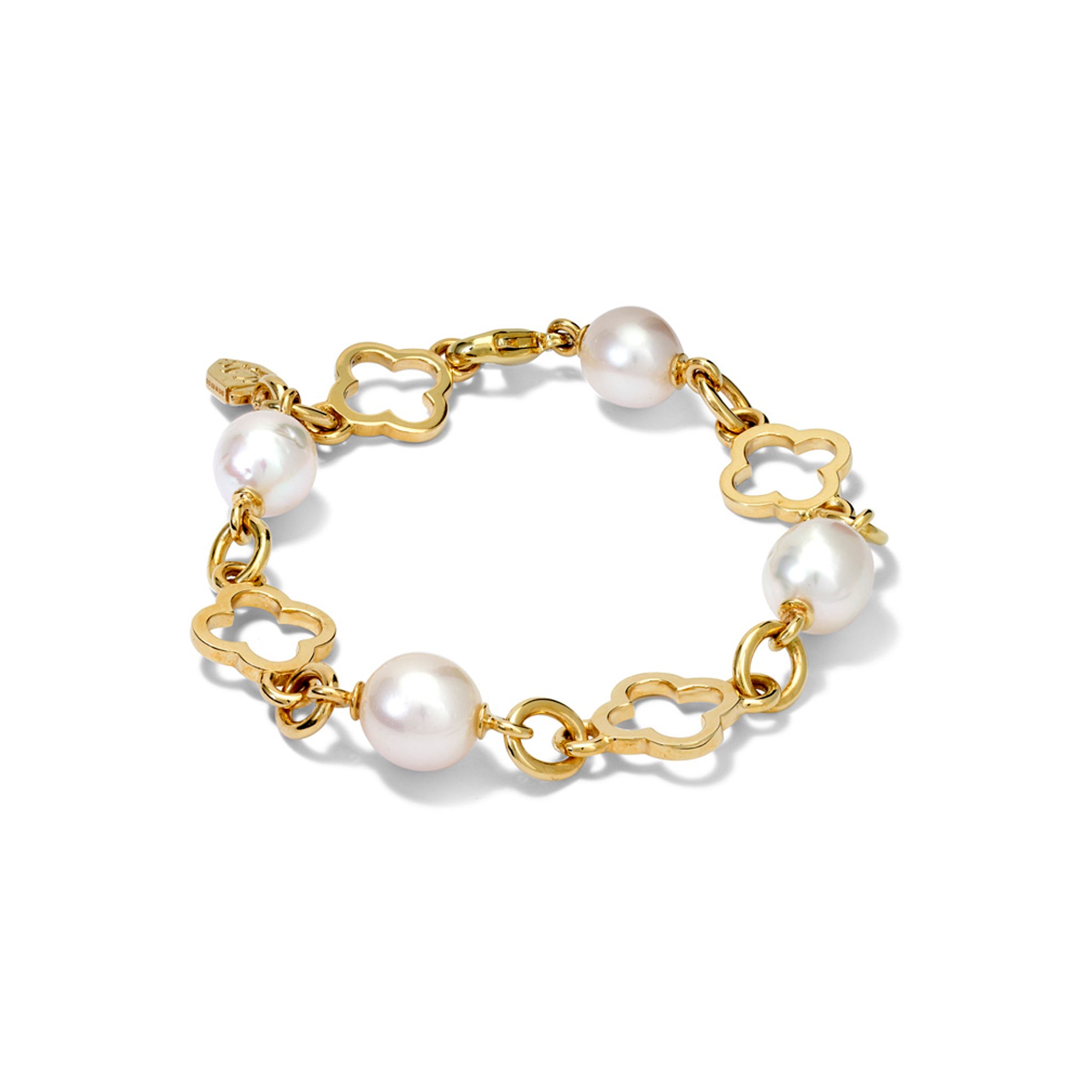 Handcrafted yellow gold bracelet with star-shaped links, spaced with pearls, birthstone of June.