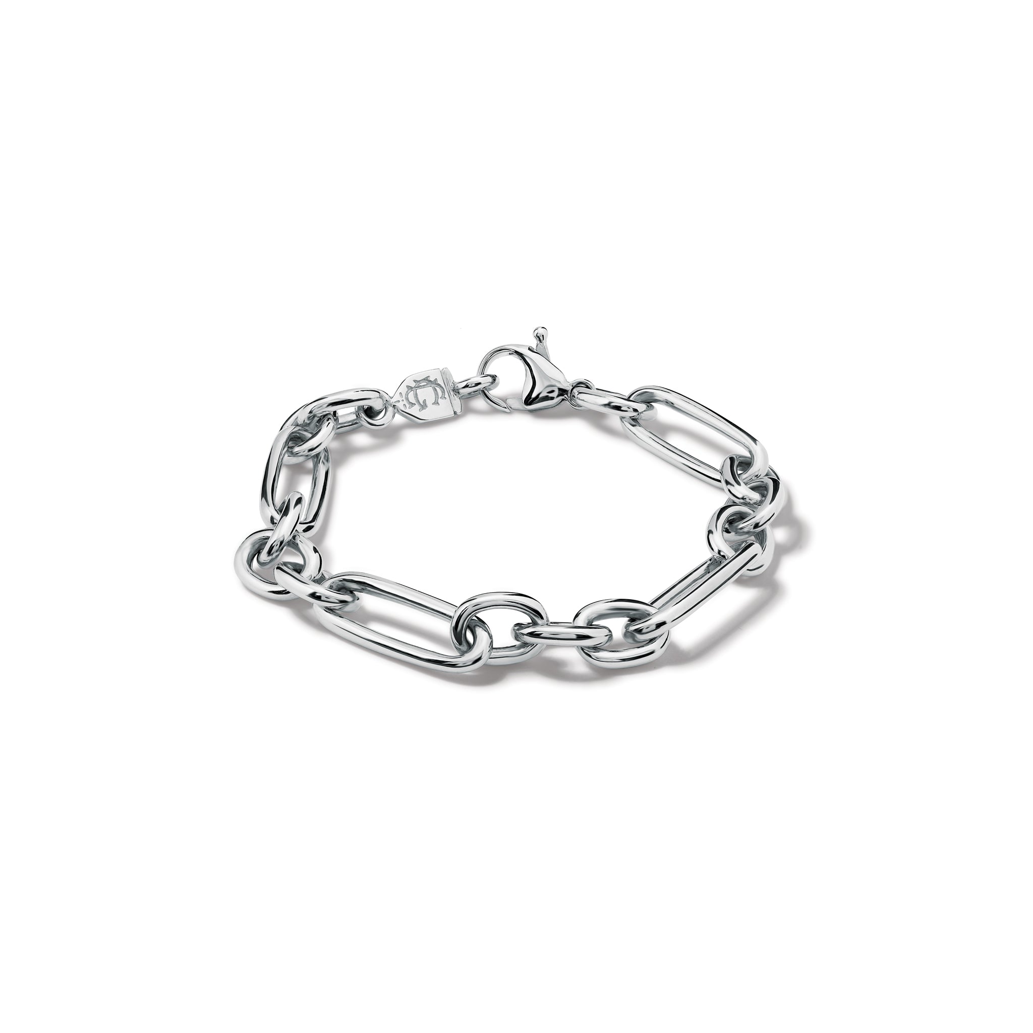 Handcrafted sterling silver link bracelet featuring chunky round and rounded rectangular links interconnected.