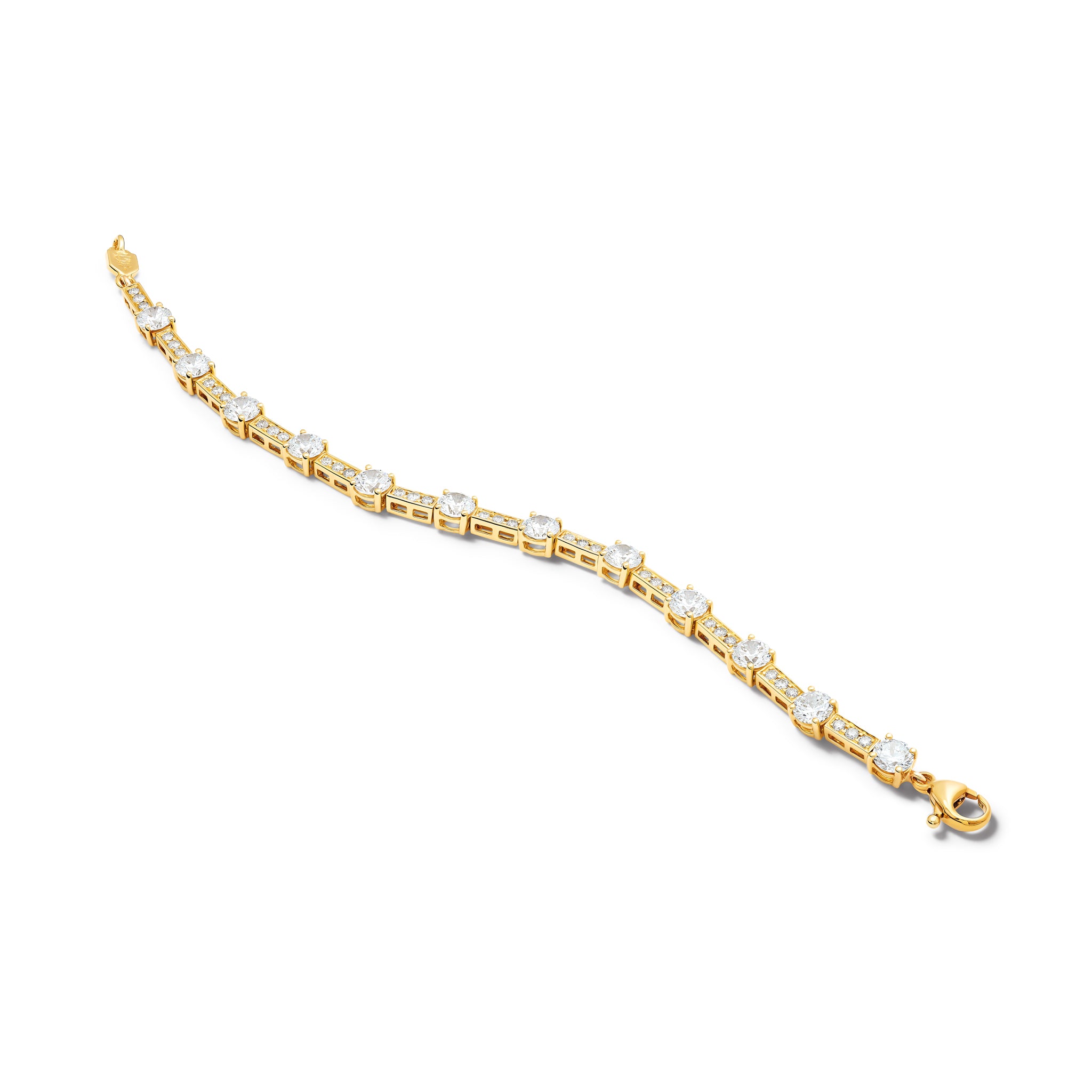 Handcrafted 18ct yellow gold bracelet with baguette cut diamonds. 
