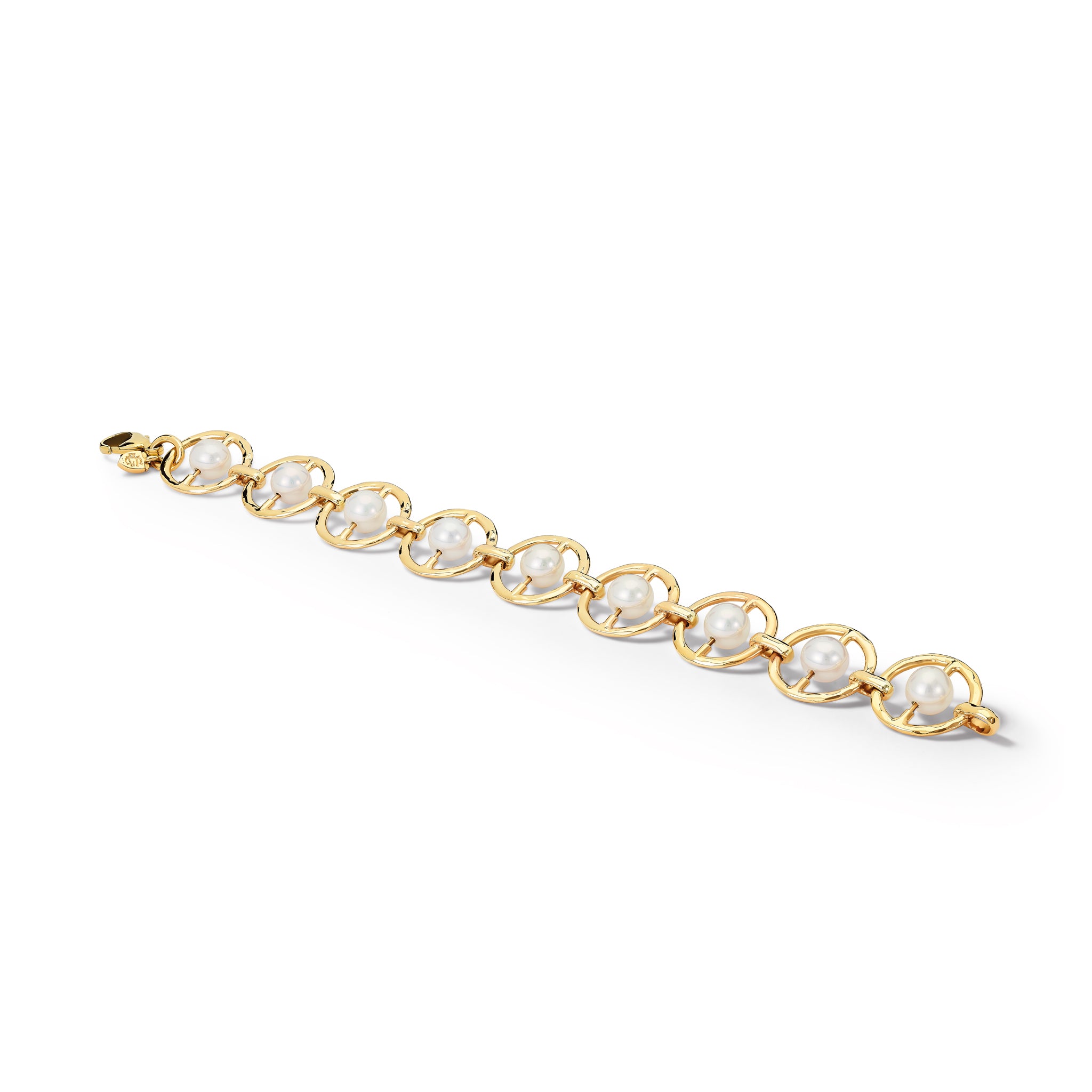 Handcrafted yellow gold bracelet with horizontally aligned circular frames, each encircling a pearl.