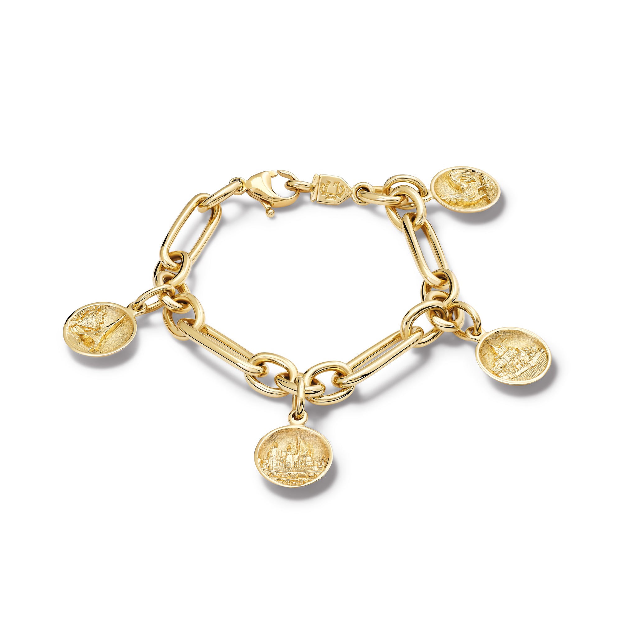 Handcrafted yellow gold charm bracelet featuring five gold charms 'en relief' with architecture in France.