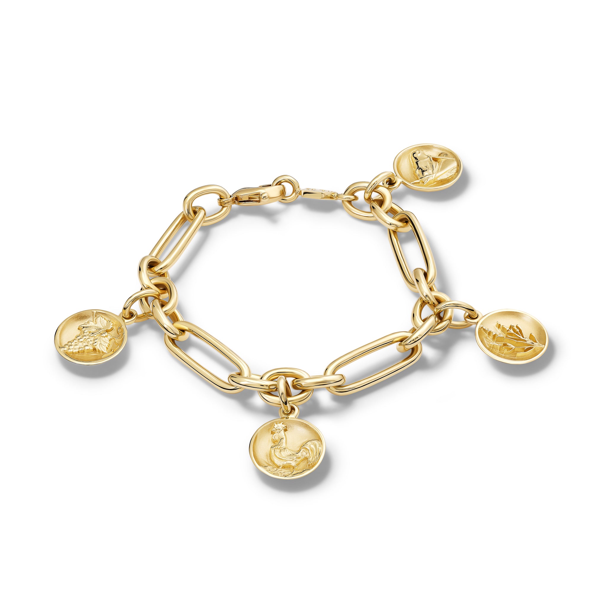 Handcrafted yellow gold charm bracelet featuring five gold charms 'en relief' with culture in France.