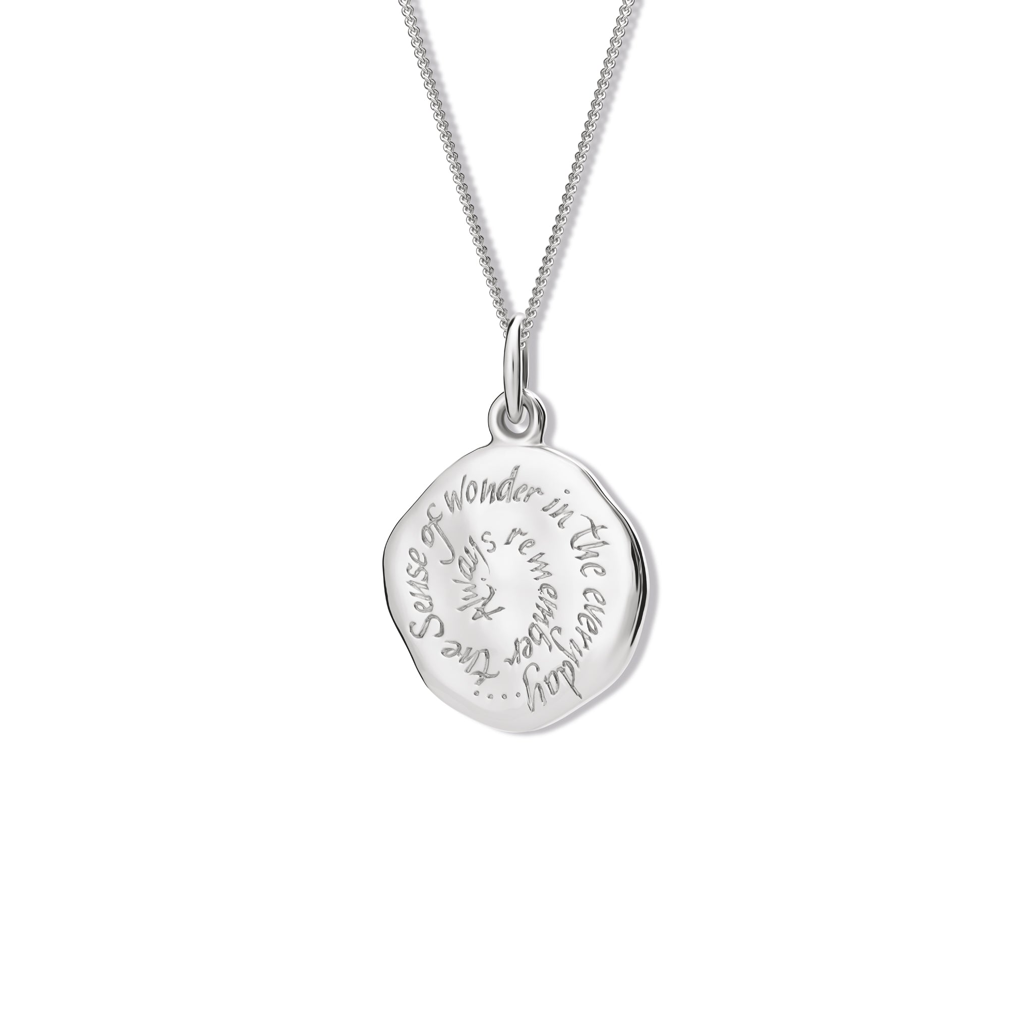 Handcrafted round sterling silver pendant necklace engraved with the quote, 'Always remember the sense of wonder in the everyday.'