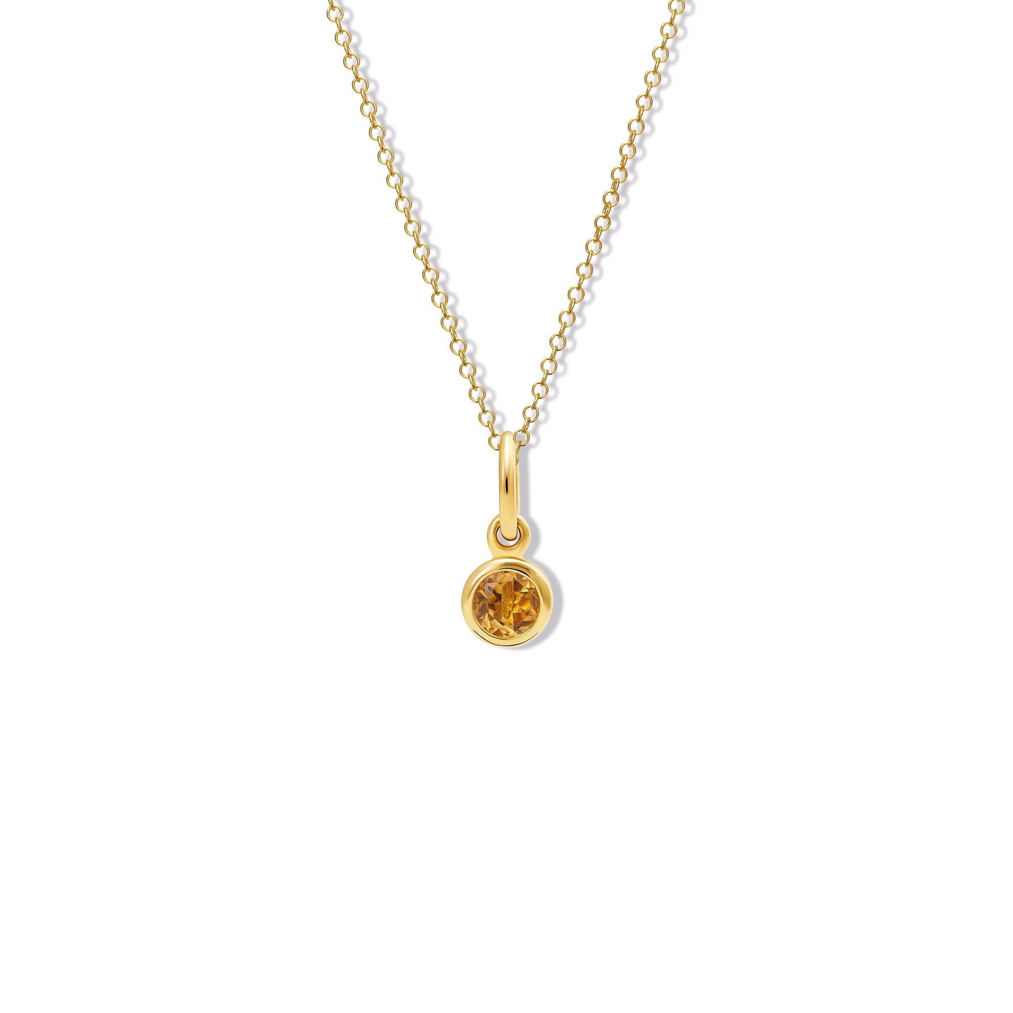 Handcrafted necklace pendant in yellow gold featuring a round citrine drop, birthstone of November.