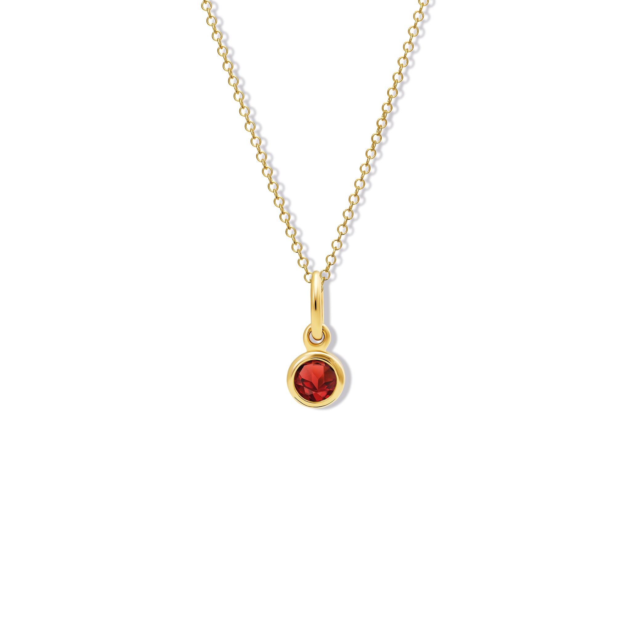 Handcrafted necklace pendant in yellow gold featuring a round garnet drop, birthstone of January.