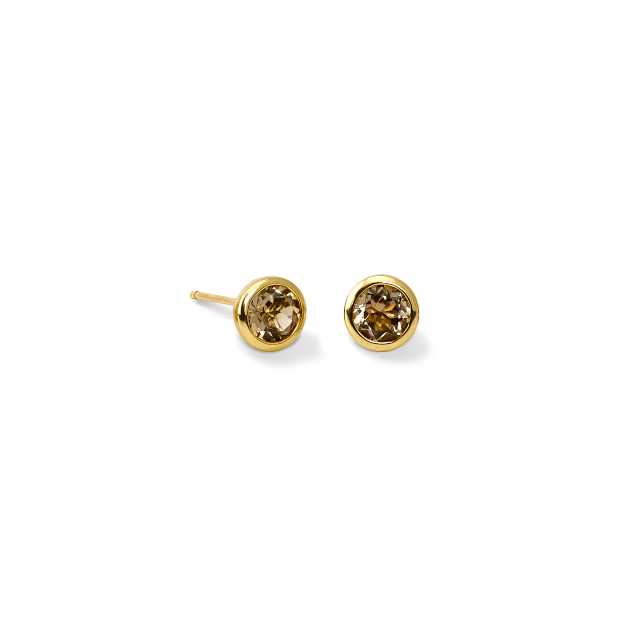 Handcrafted yellow gold stud earrings featuring round smoky quartz.