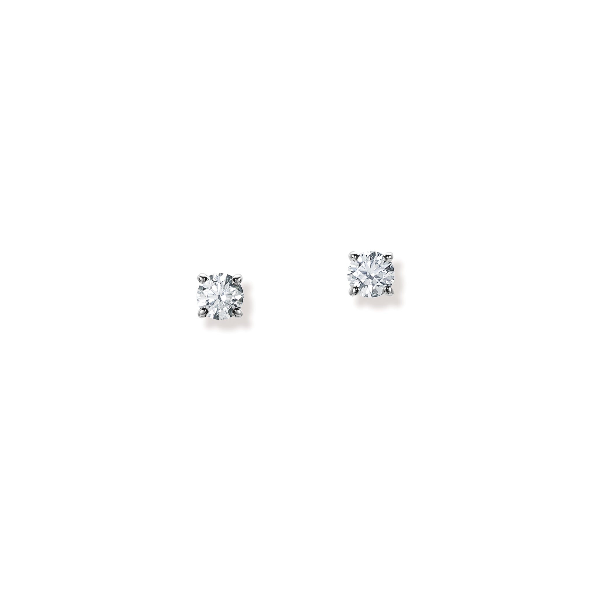 Handcrafted white gold stud earrings featuring claw set diamonds.