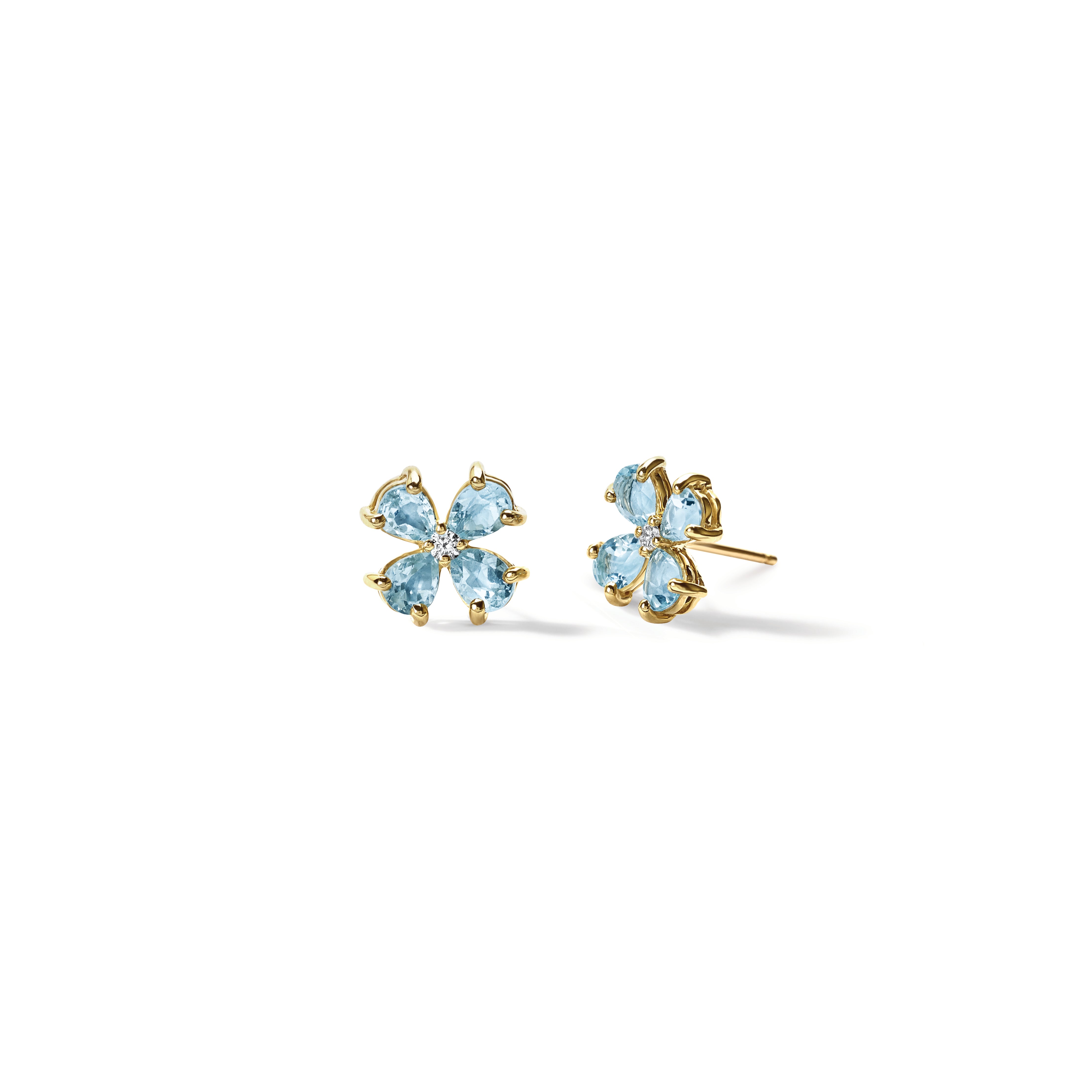 Handcrafted yellow gold four-leaf clover earring studs with blue topaz and diamond, birthstone of November.