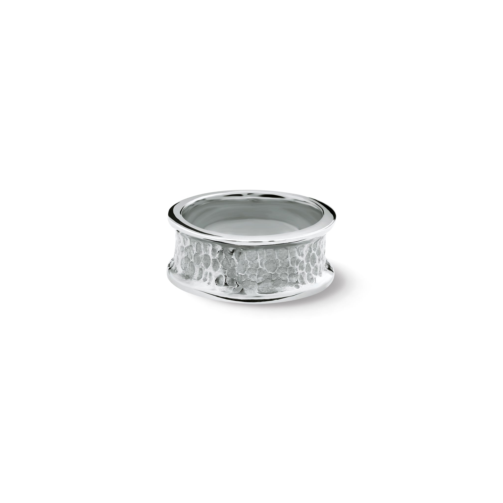 Handcrafted sterling silver ring featuring tortilla shaped circles along the band.
