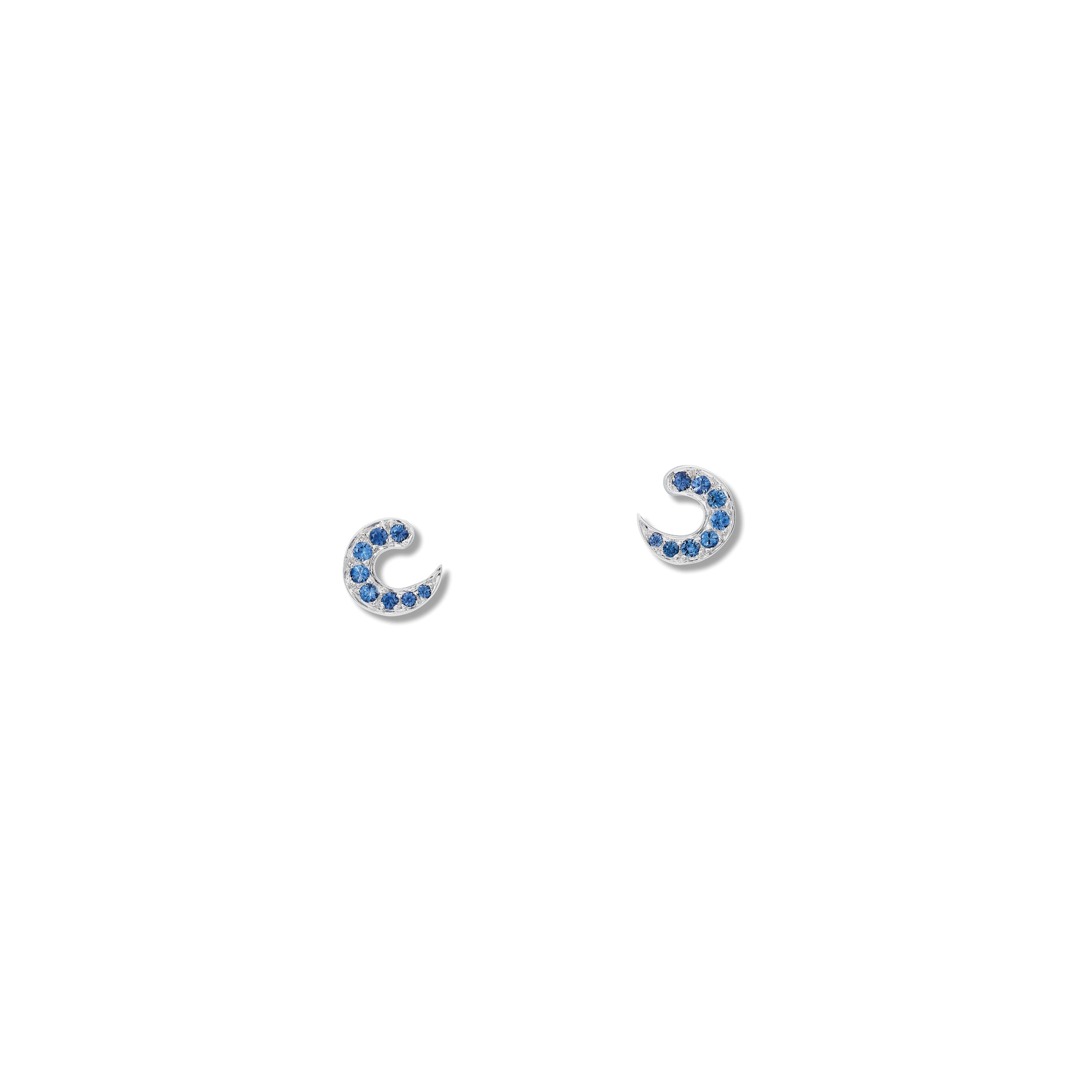 Handcrafted 18ct white gold stud earrings featuring a crescent shape with sapphire pavé, birthstone of September.