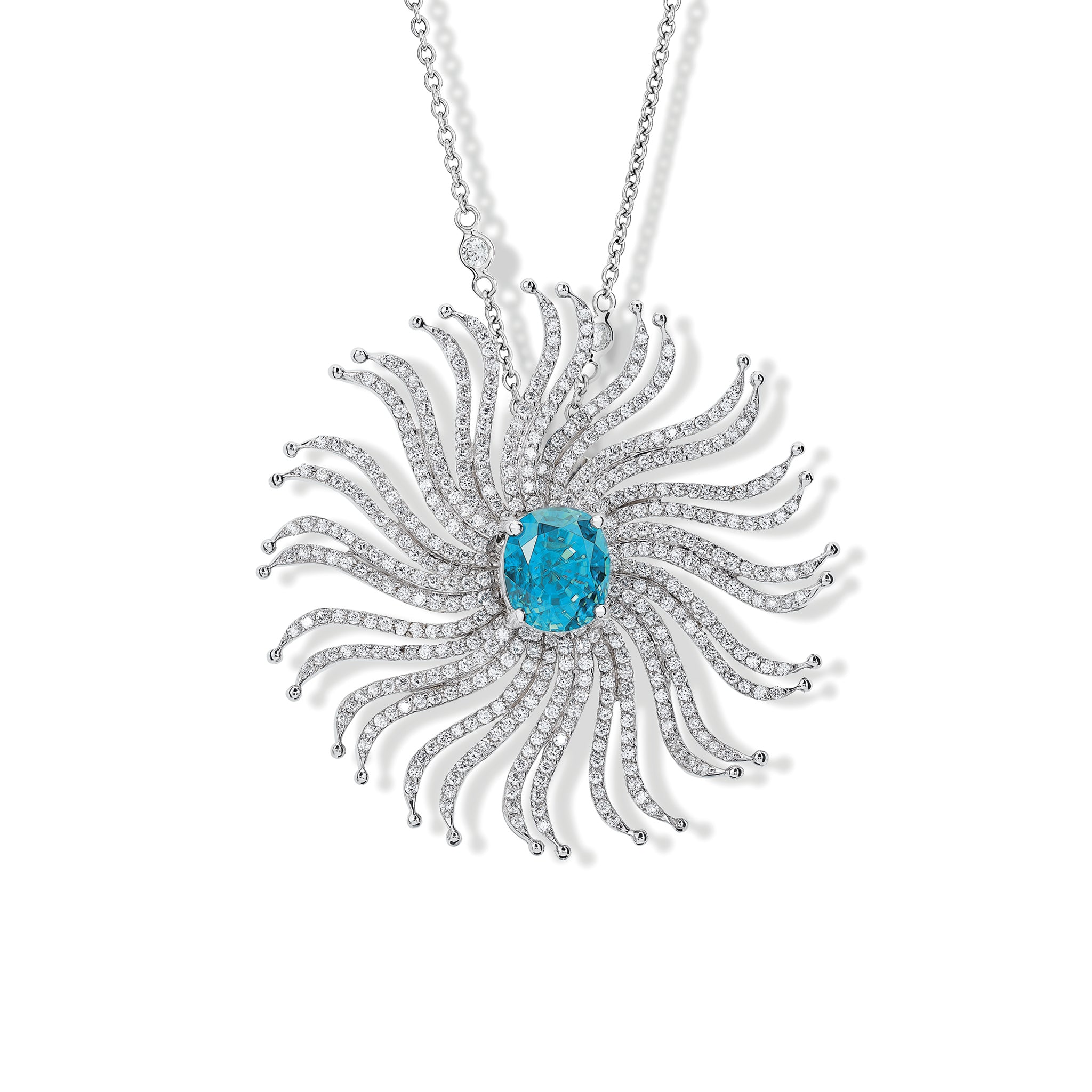 Handcrafted 18ct white gold necklace pendant featuring a spider web shape of diamonds with a central blue zircon.
