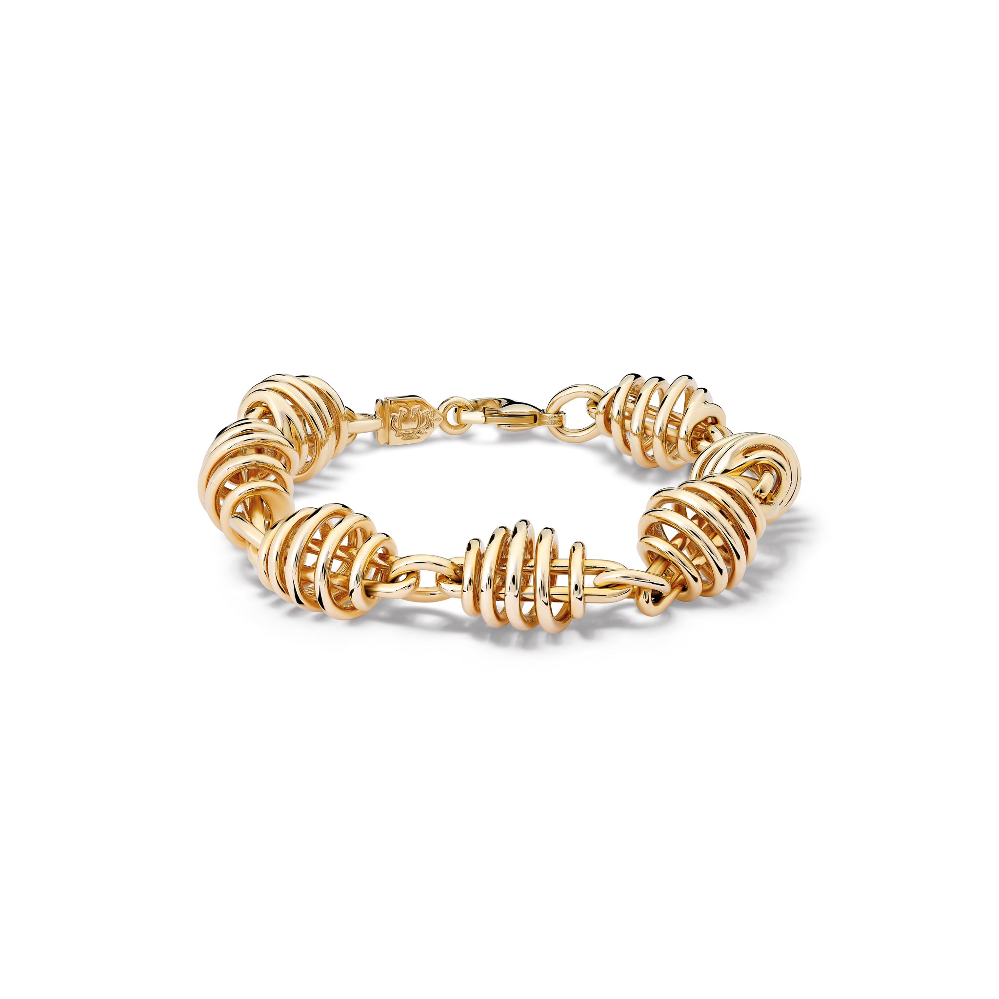 Handcrafted yellow gold bracelet featuring honey spoon shaped gold. 