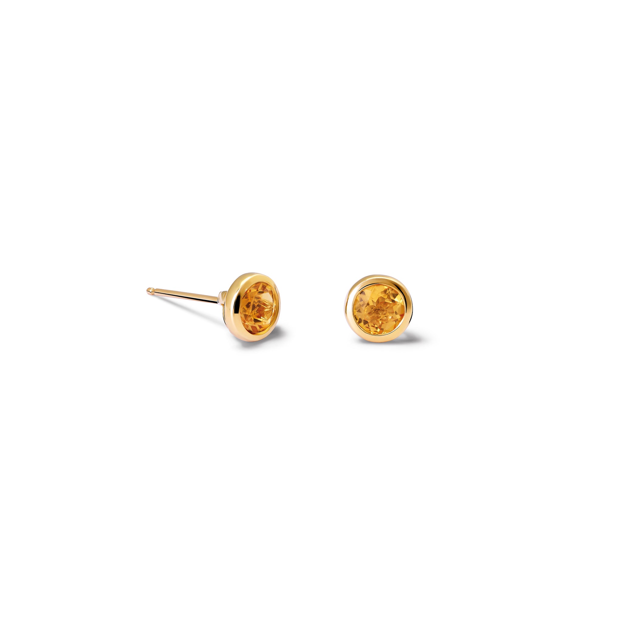 Handcrafted yellow gold stud earrings featuring round citrine, birthstone of November.