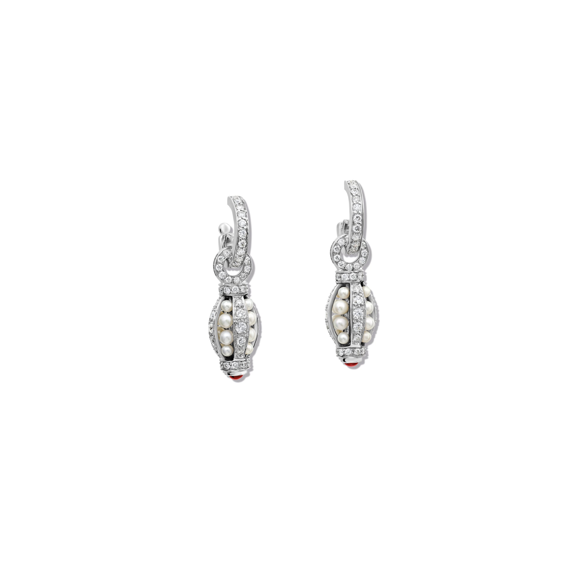 Handcrafted 18ct white gold teardrop shaped earring drops with pearls enclosed with diamonds and a ruby at the bottom. 