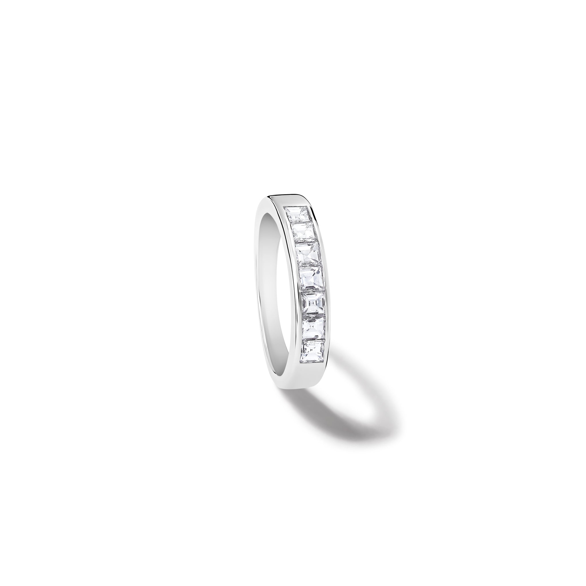 Handcrafted 18ct white gold half eternity ring with diamonds.
