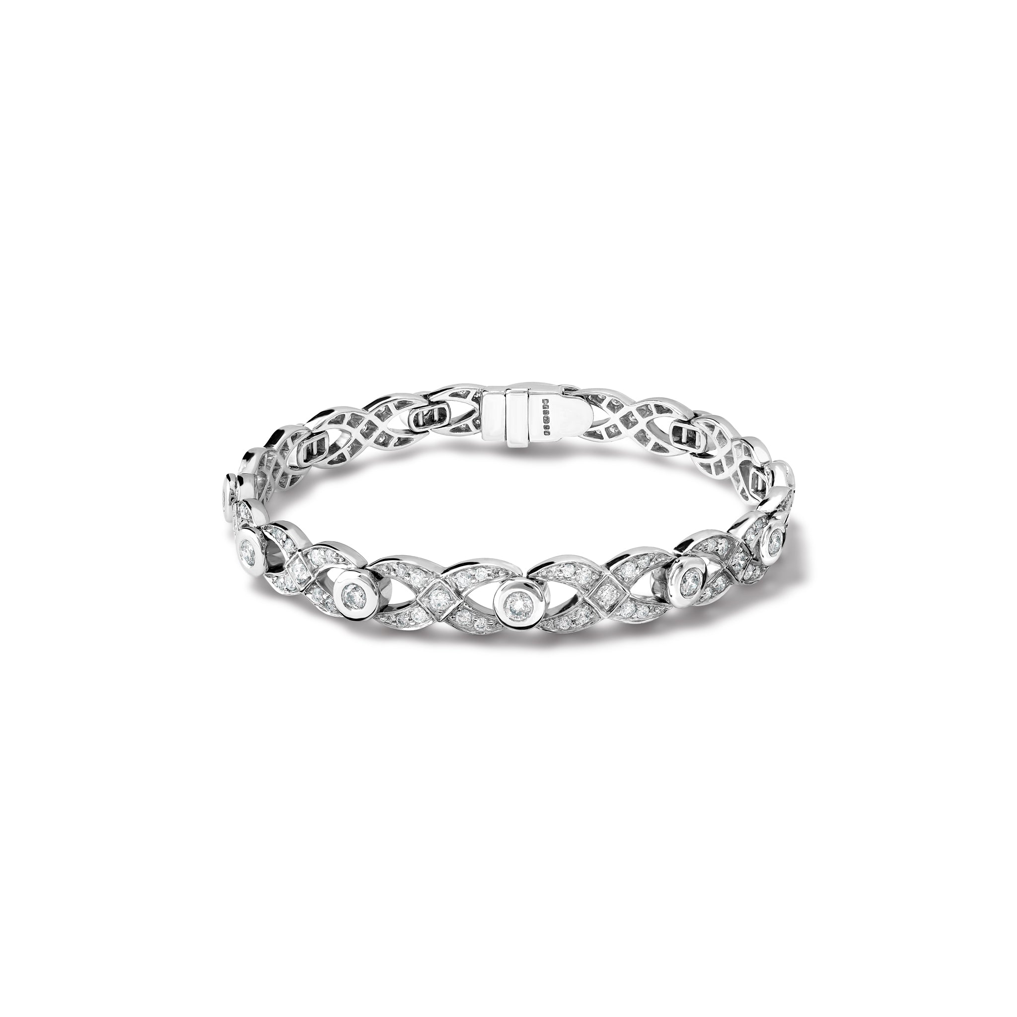 Handcrafted 18ct white gold bracelet with a looping pattern, set with round cut diamonds. 
