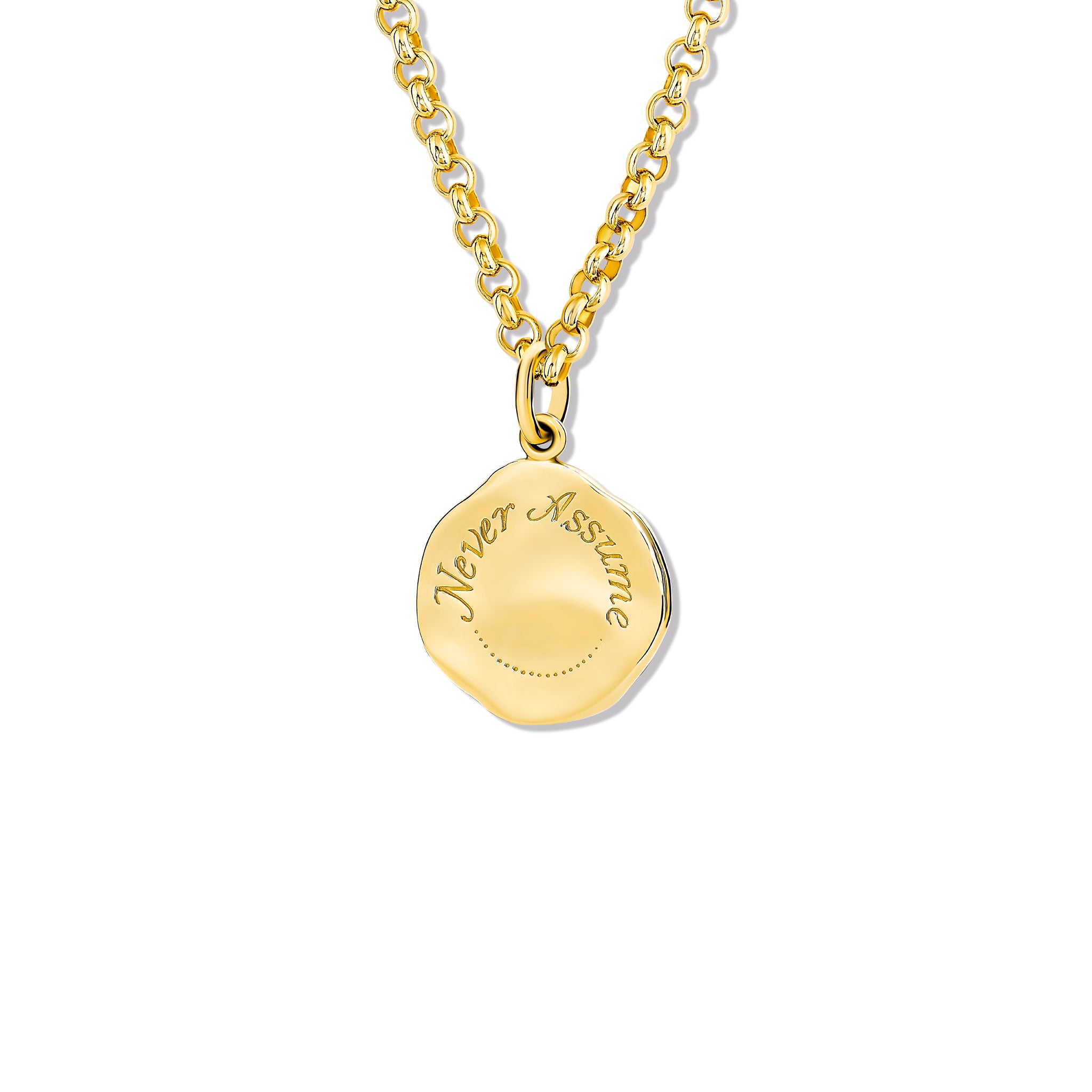 Handcrafted yellow gold necklace pendant engraved with the quote, 'Never Assume.' 