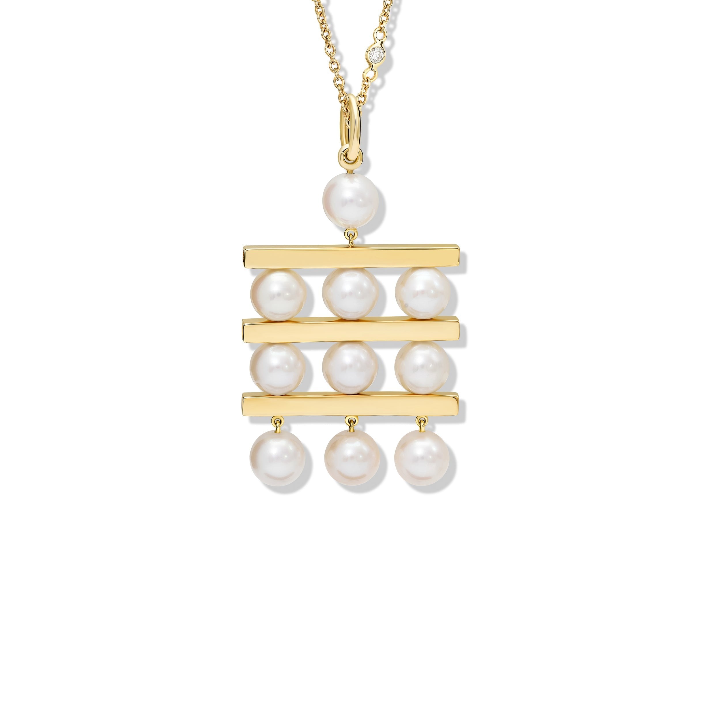 Handcrafted yellow gold necklace pendant with three tiers of pearls separated by delicate yellow gold lines.