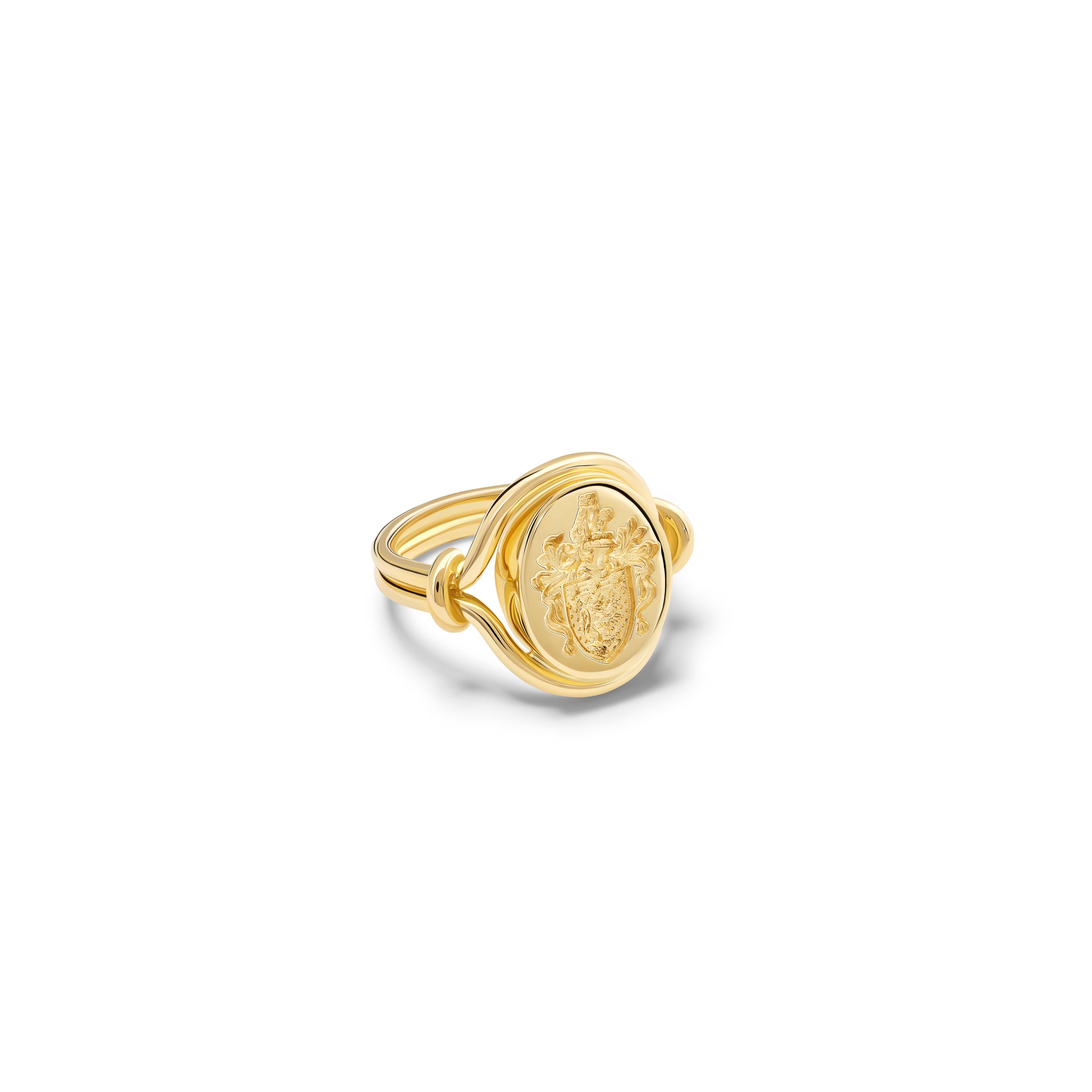 Handcrafted yellow gold signet ring featuring a smooth, round central disc with sleek, curved band accents.