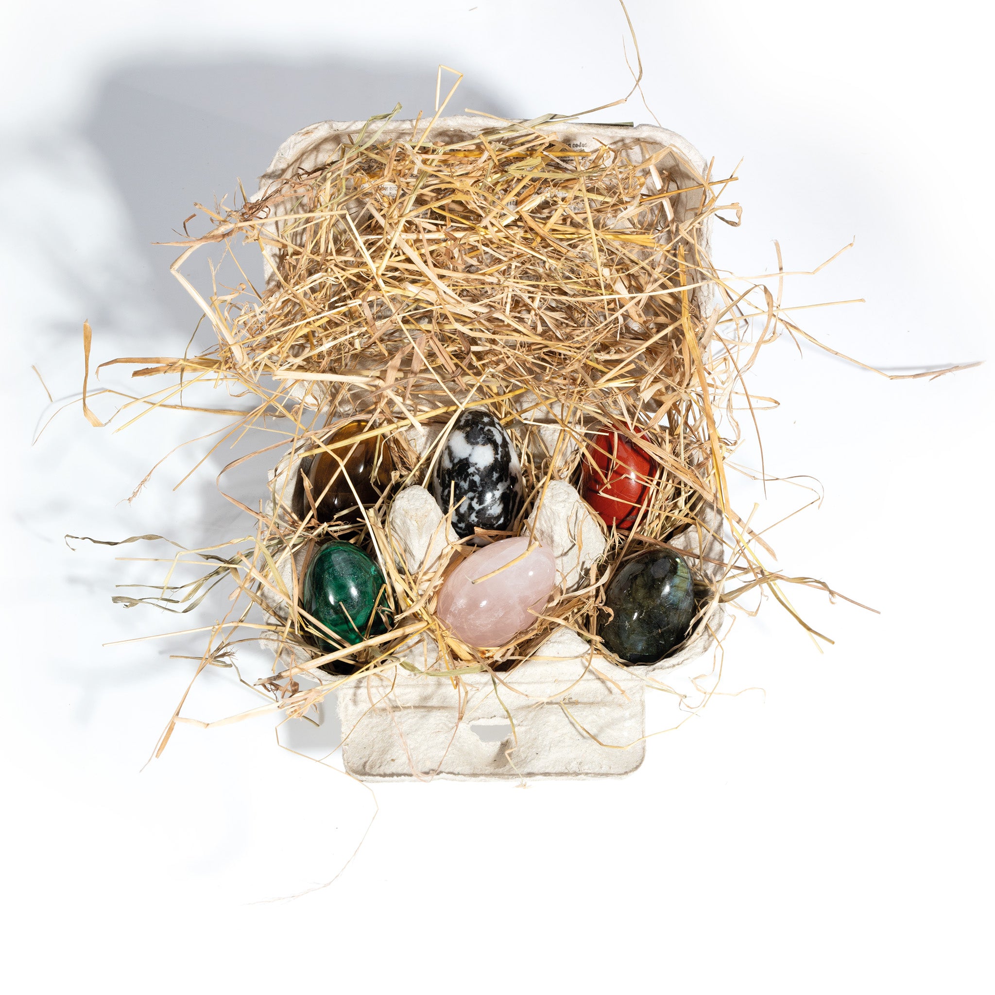 Handcrafted gemstone shaped as a quail's egg.
