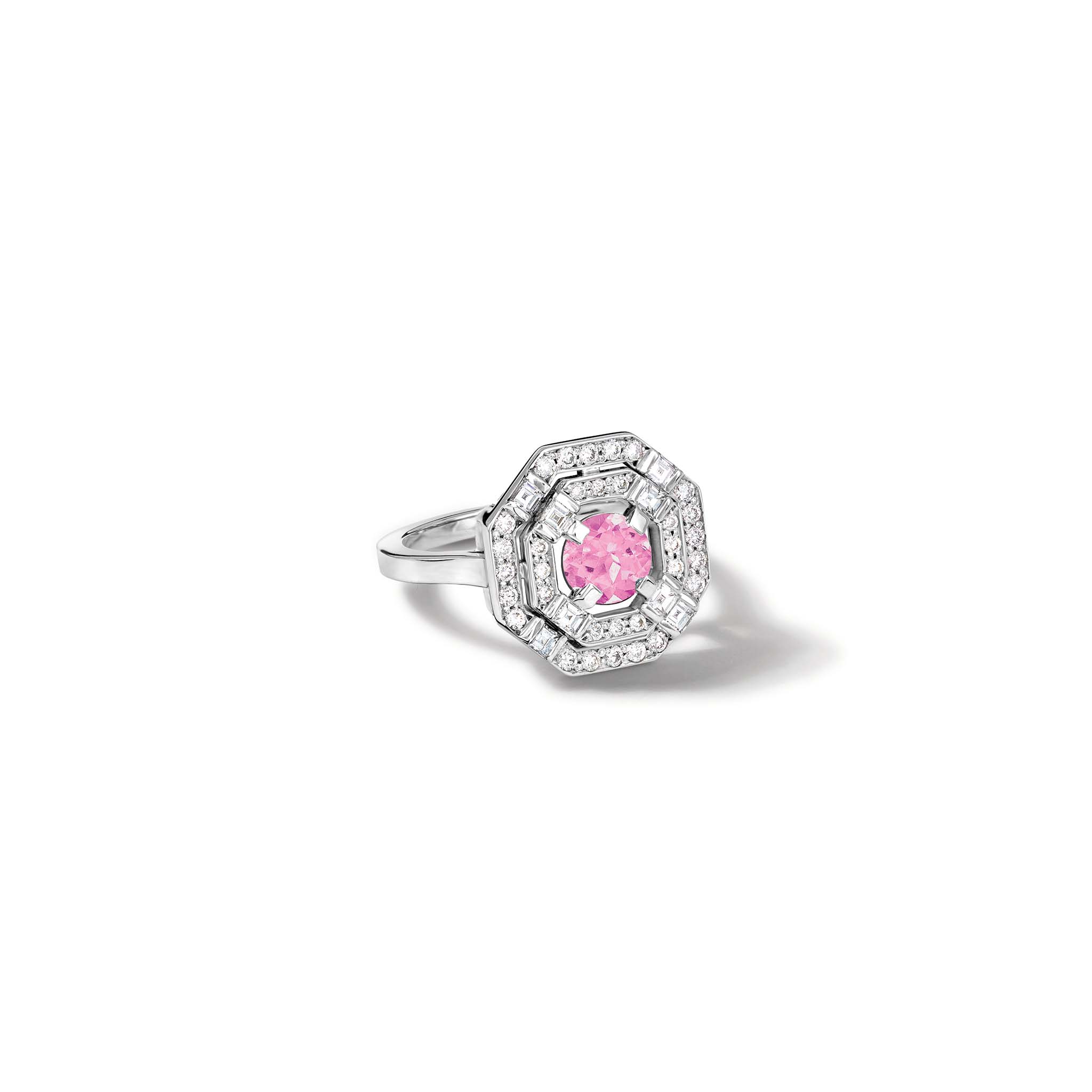 Handcrafted 18ct white gold engagement ring featuring a central square-cut pink tourmaline, surrounded by two tiers of small round diamonds set in a hexagonal pattern. 