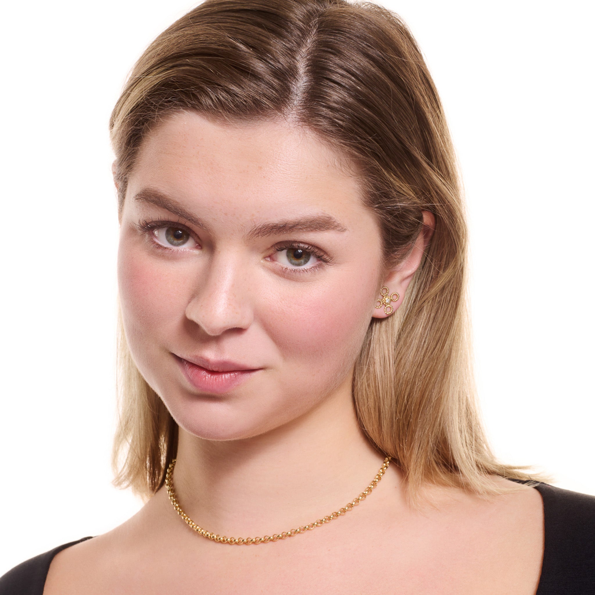 Model wearing a handcrafted yellow gold necklace chain featuring small chunky round links.