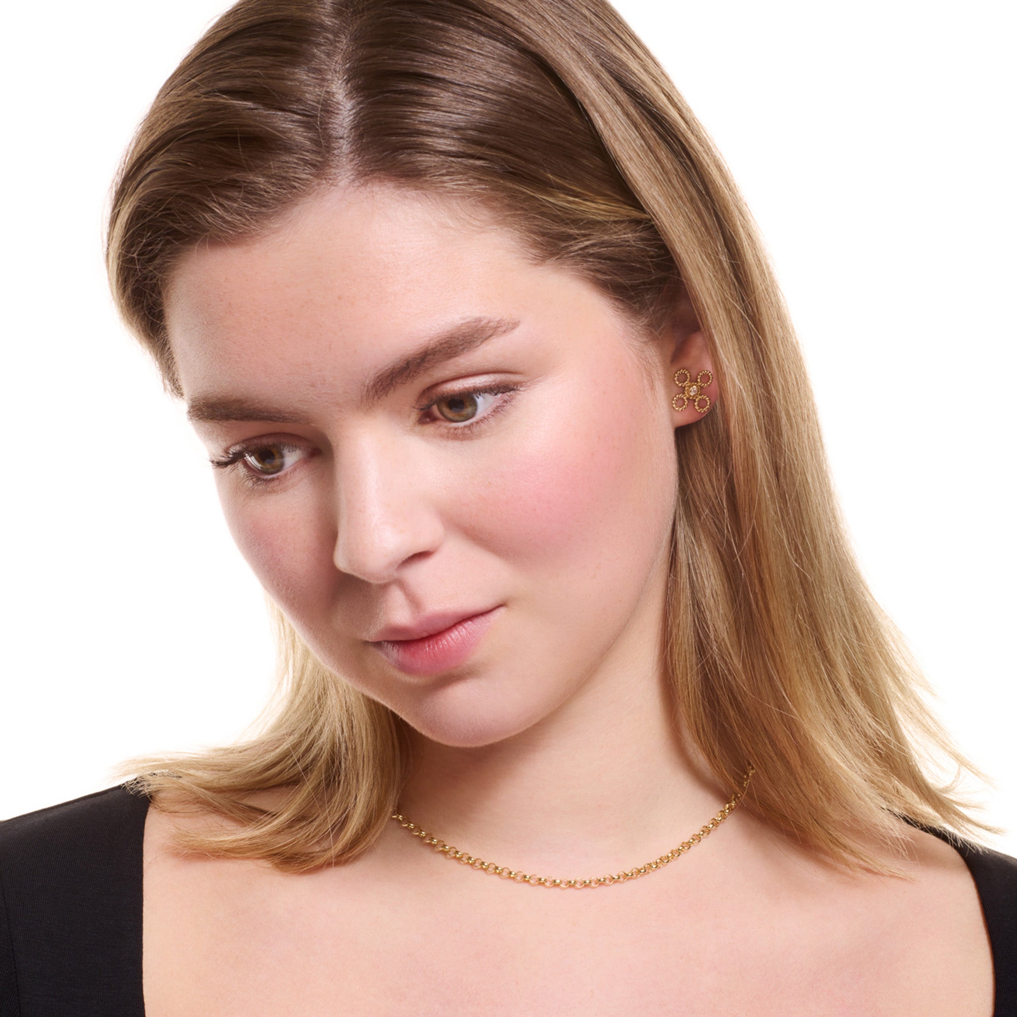 Model wearing a handcrafted yellow gold necklace chain featuring small round links.