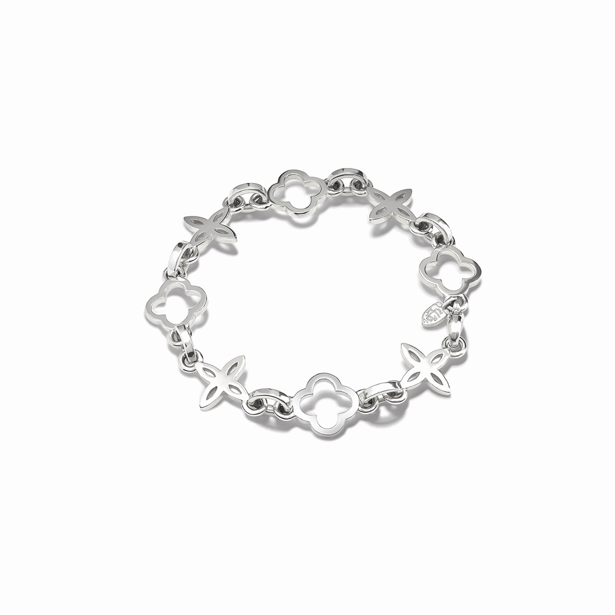 Handcrafted sterling silver bracelet with star-shaped links.
